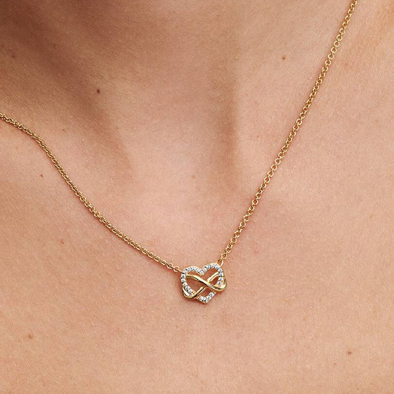 COLLANA PANDORA CUORE INFINITO DORATO CON PIETRE LUMINOSE