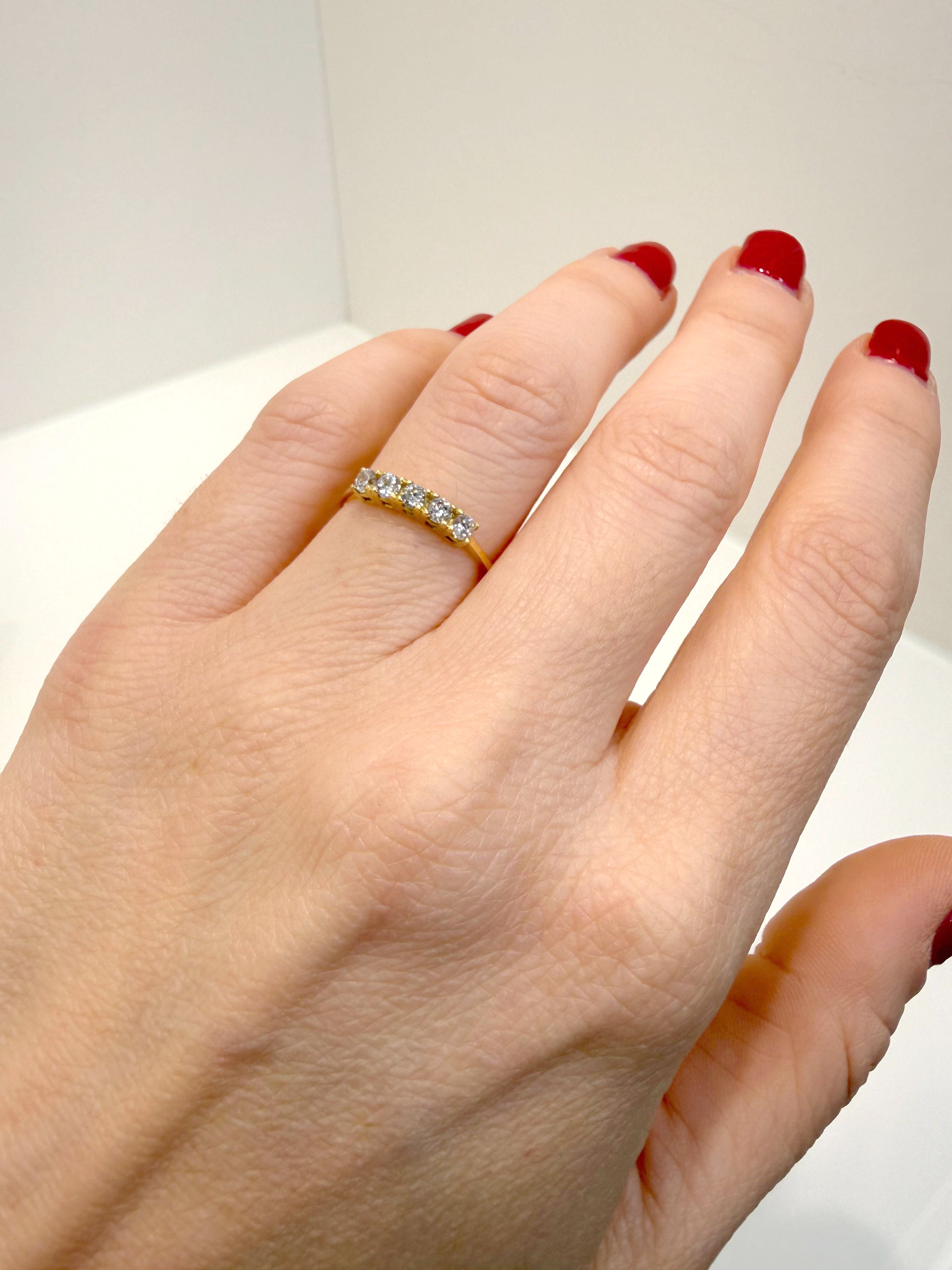 Anello riviera in oro giallo 18KT (750) con zirconi bianchi - Made in Italy