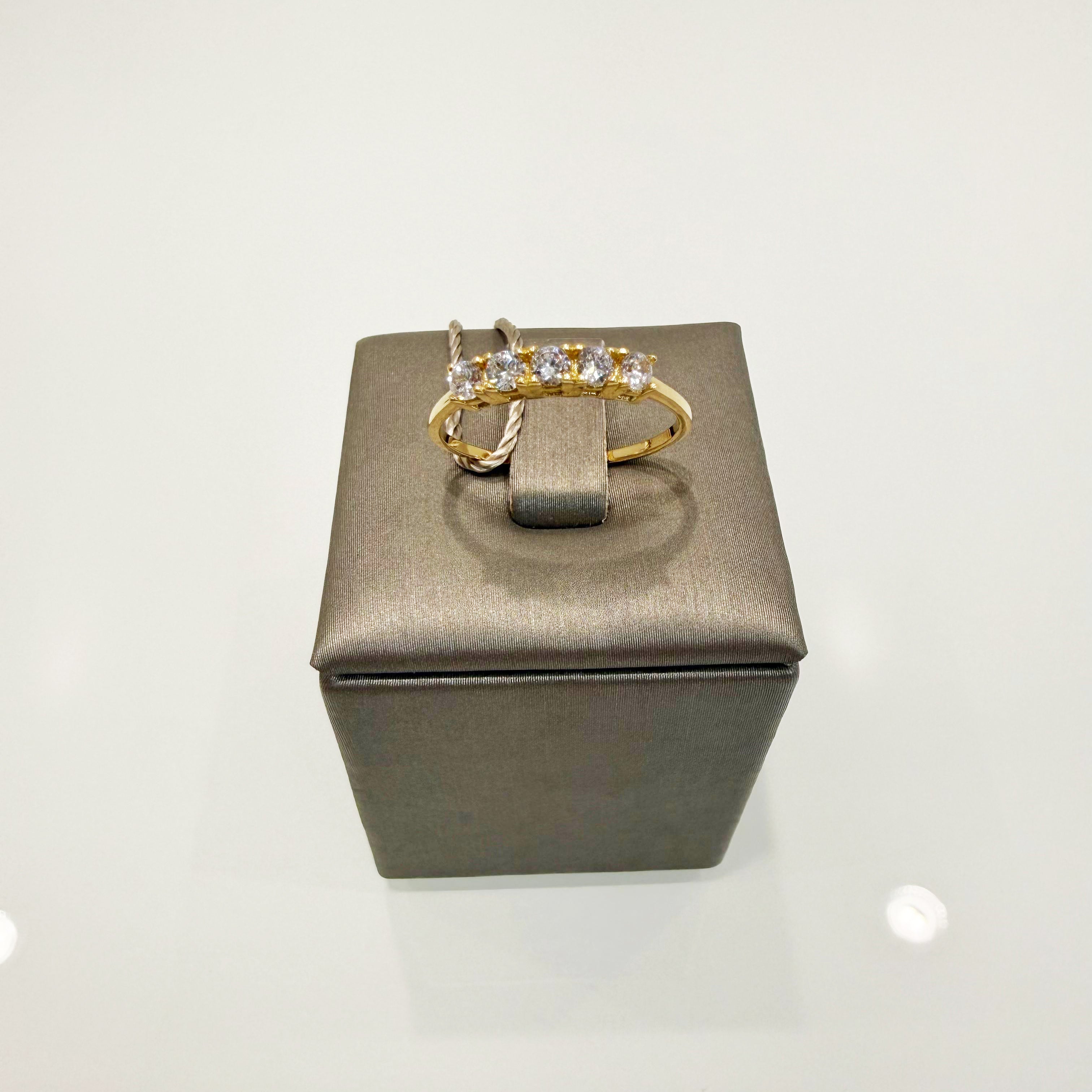 Anello riviera in oro giallo 18KT (750) con zirconi bianchi - Made in Italy