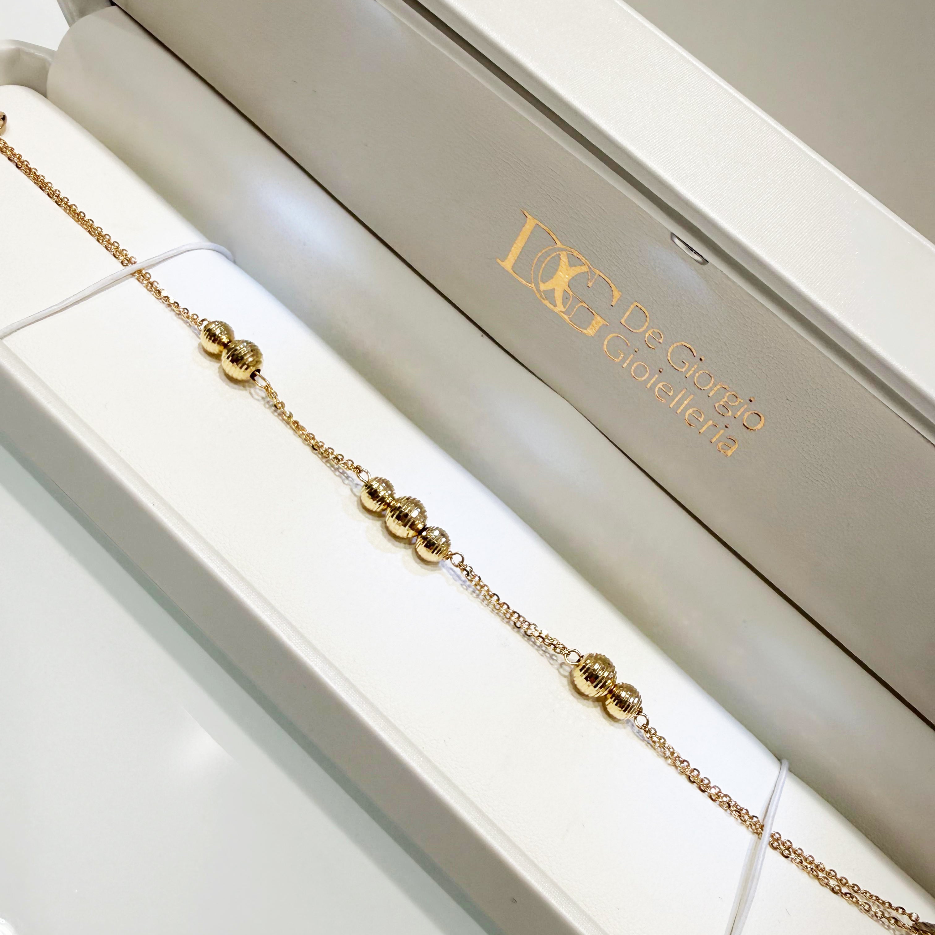 Bracciale con sfere diamantate in oro giallo 18KT (750) – Made in Italy