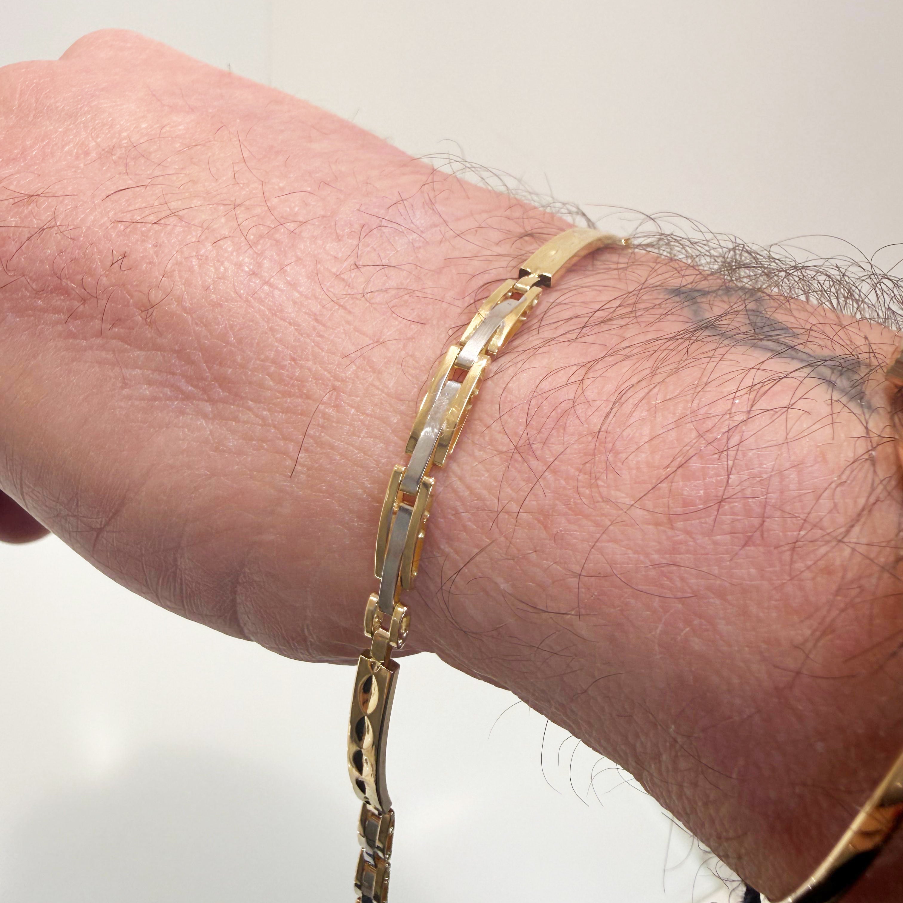 Bracciale uomo bicolore in oro giallo e oro bianco 18KT (750) con maglie lavorate – Made in Italy