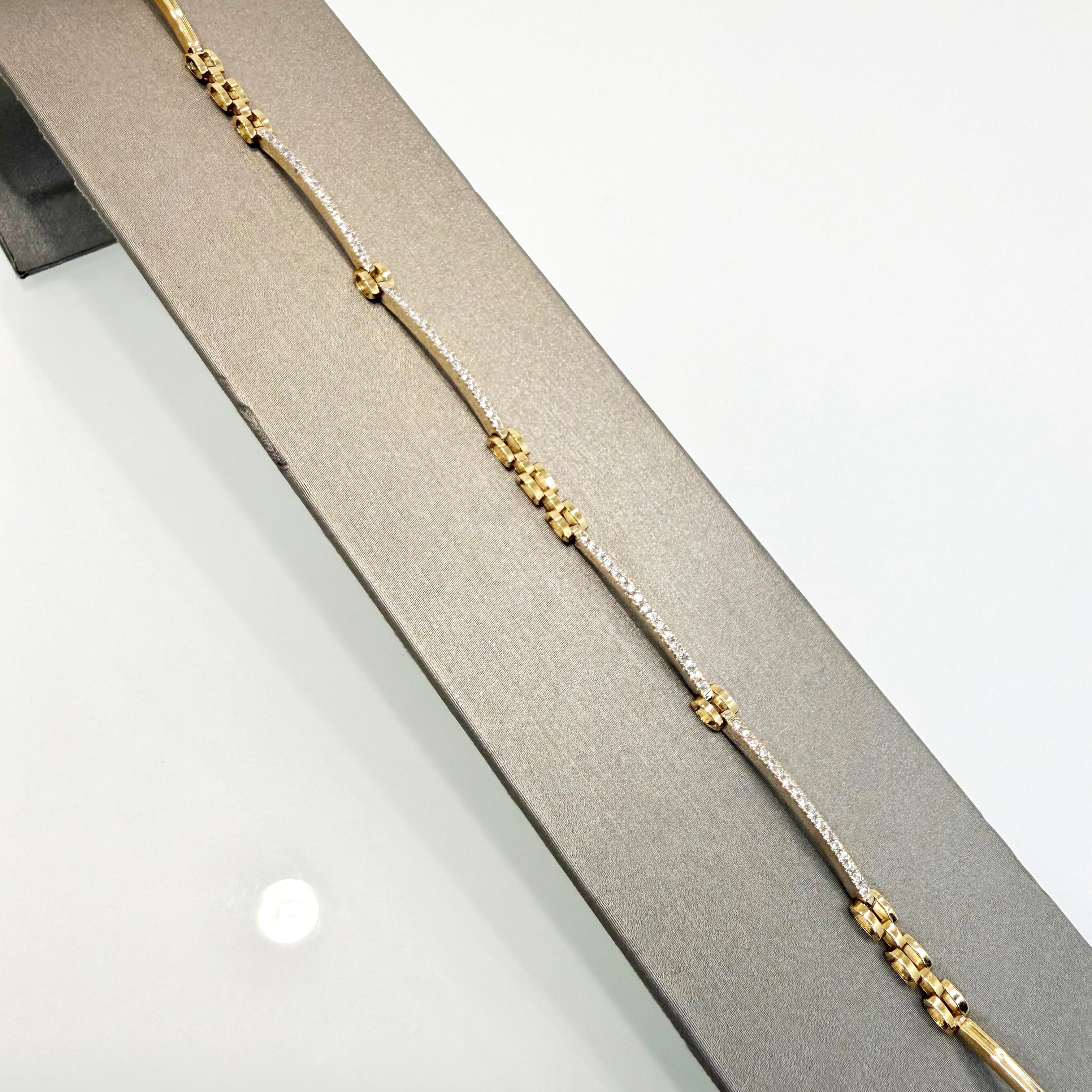 Bracciale semirigido con zirconi in oro giallo 18KT (750) – Made in Italy