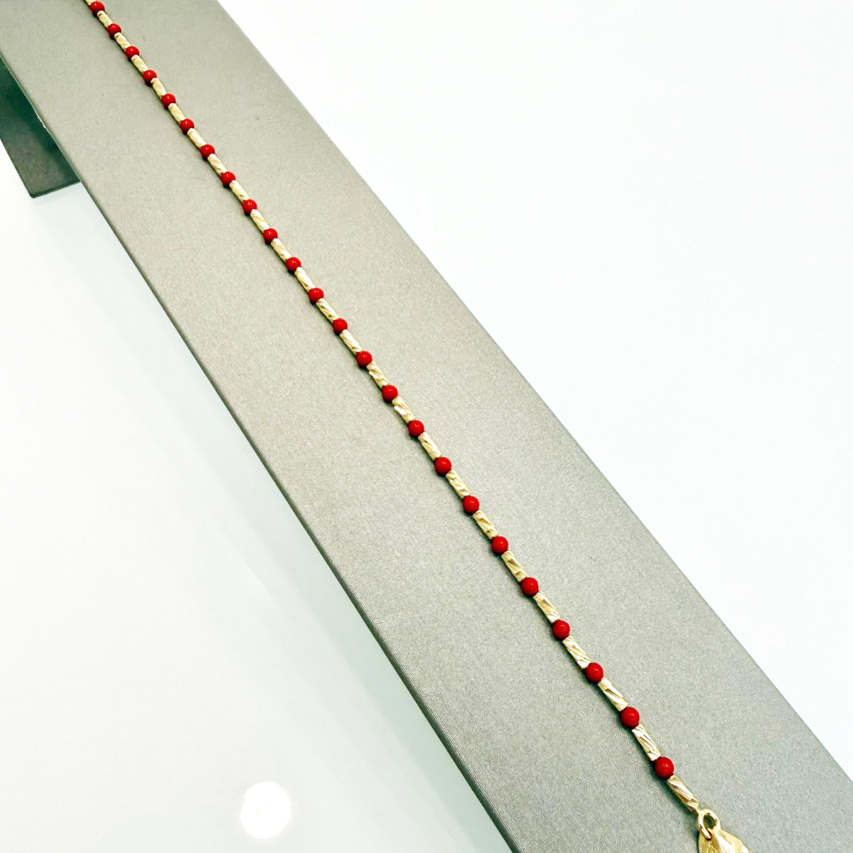 Bracciale con sfere rosse in oro giallo 18KT (750) – Unisex elegante