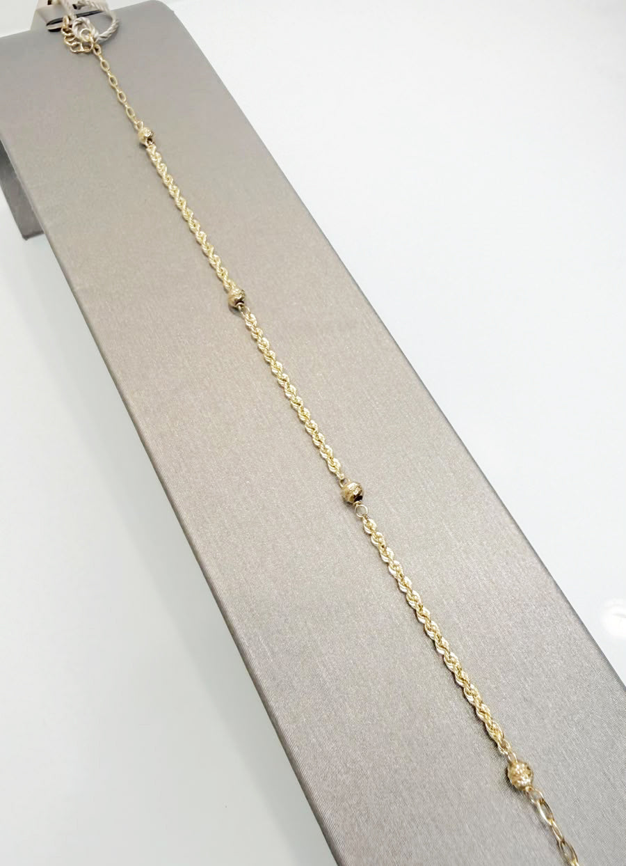 Bracciale con sfere diamantate in oro giallo 18 KT (750)