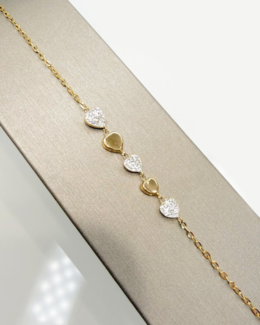 Bracciale cuori con zirconi in oro giallo 18 KT (750)