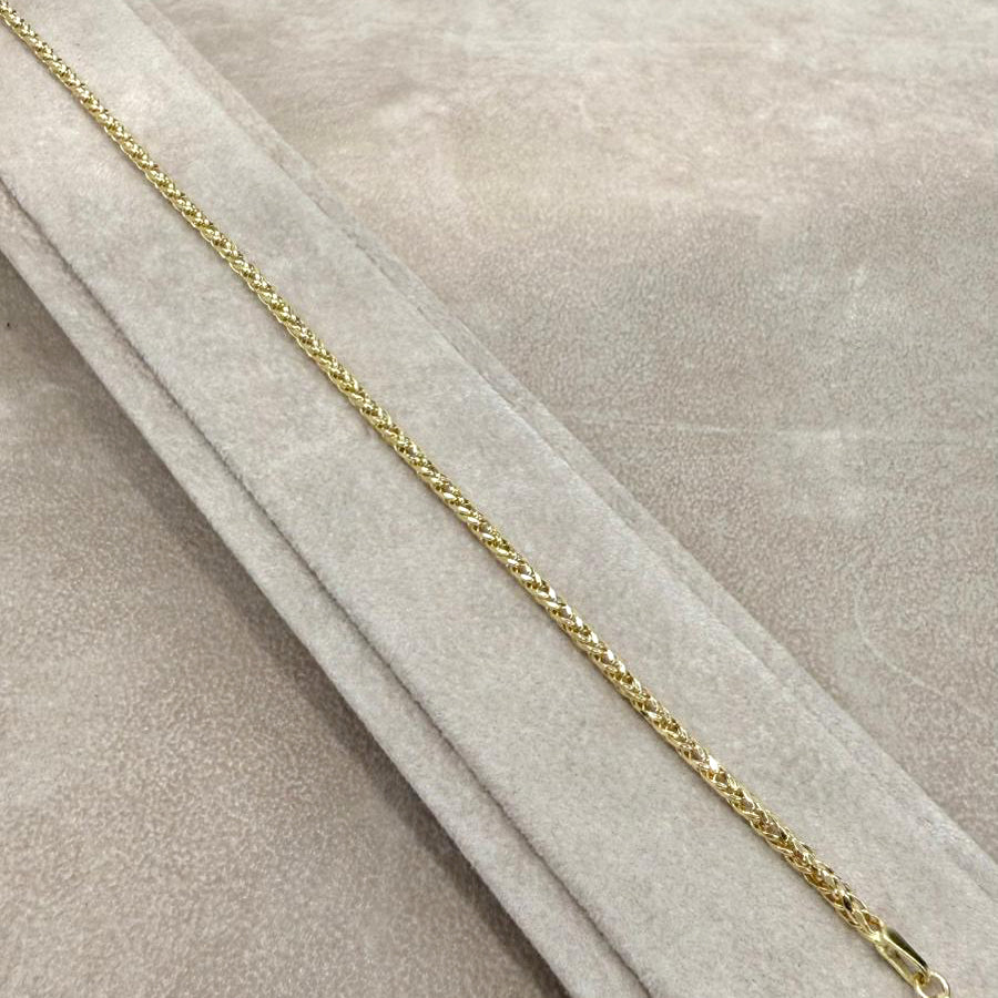 Bracciale Intrecciato Luminoso in Oro Giallo 18 KT