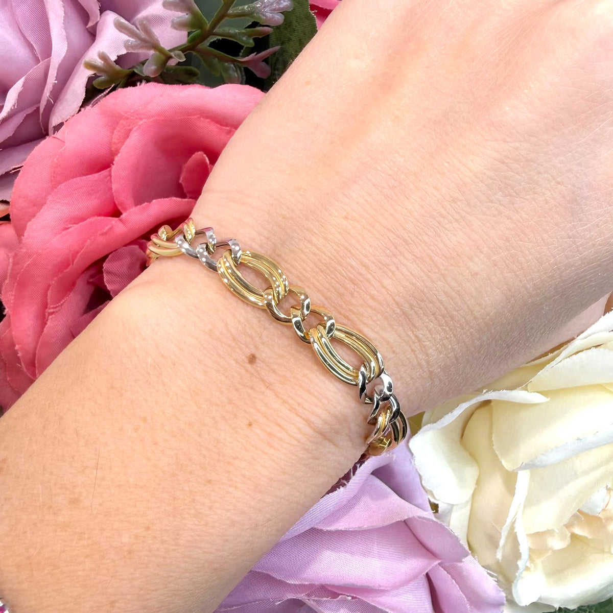 BRACCIALE IN ORO GIALLO E BIANCO 18 KT (750) CON MAGLIE OVALI