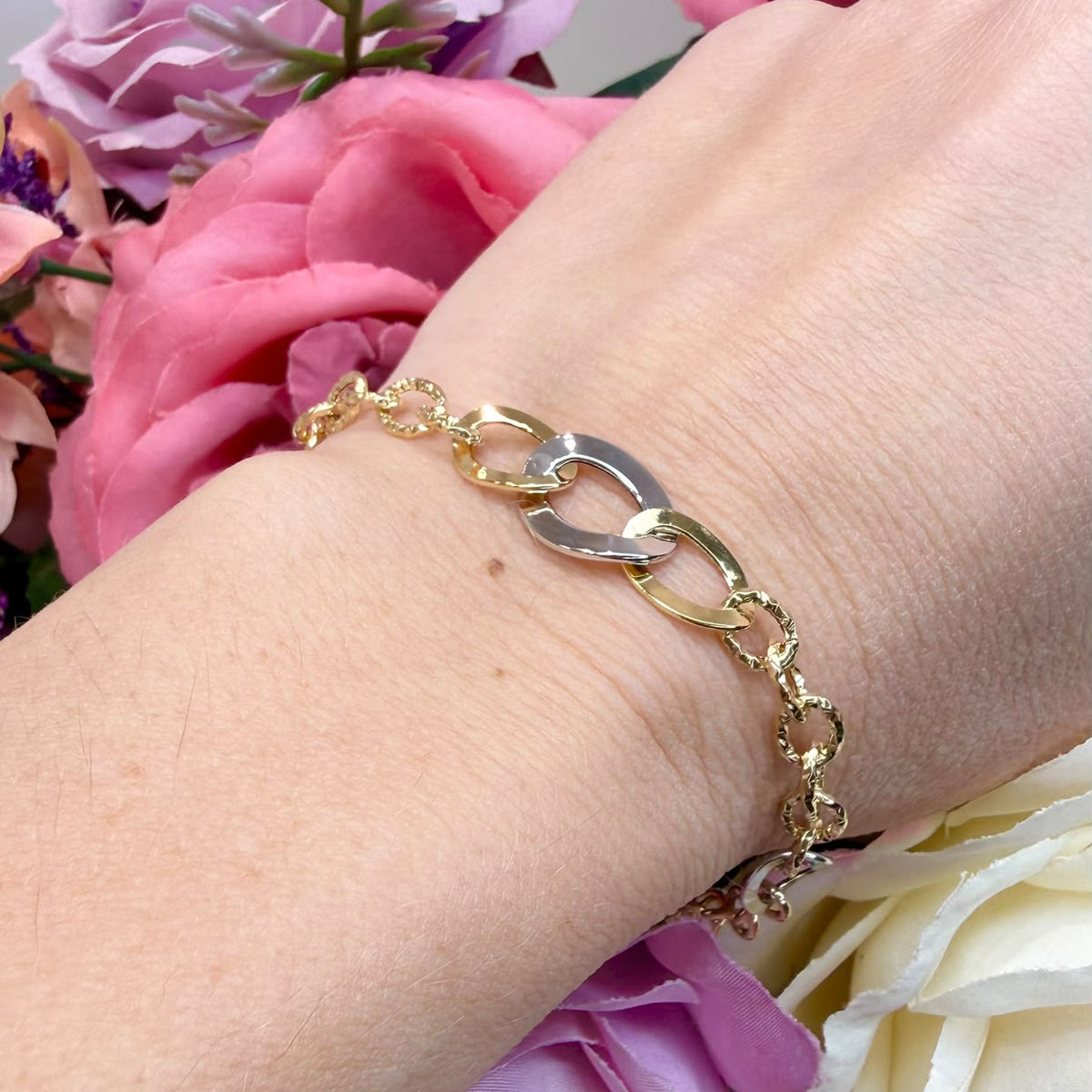 BRACCIALE IN ORO GIALLO E BIANCO 18 KT (750) CON MAGLIE OVALI