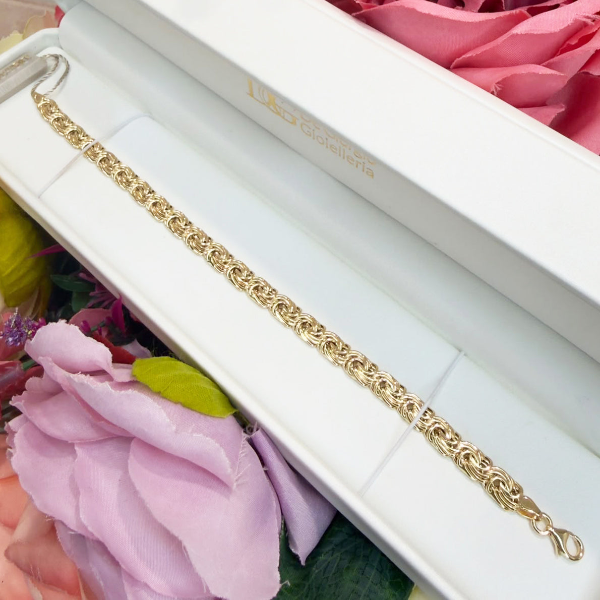 BRACCIALE A MAGLIA INTRECCIATA IN ORO GIALLO 18 KT (750)