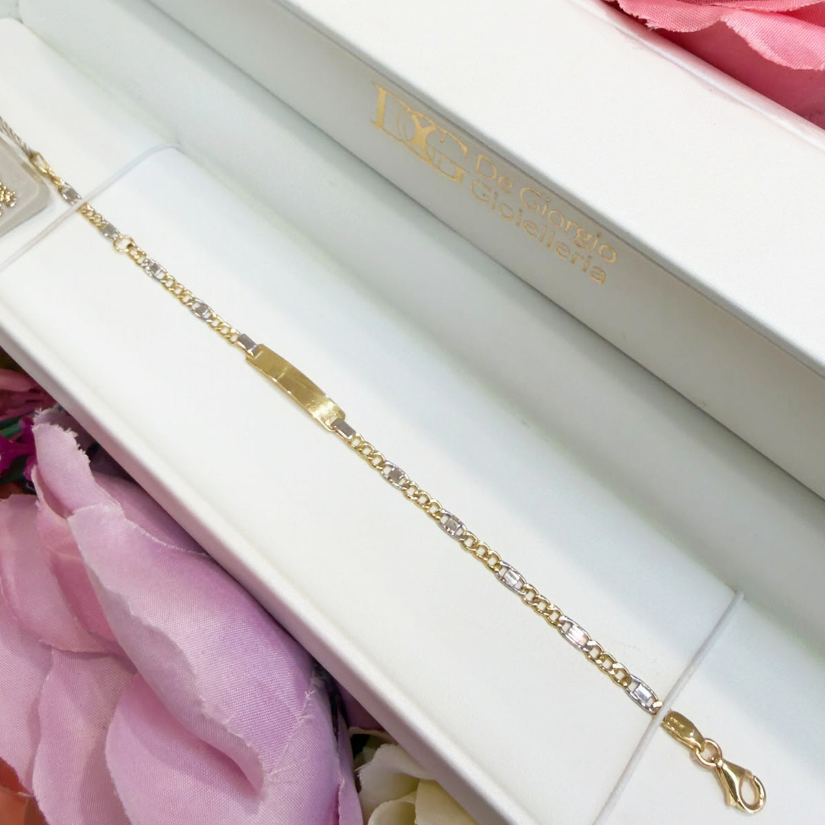 BRACCIALE BIMBO CON TARGHETTA IN ORO GIALLO E BIANCO 18 KT (750)