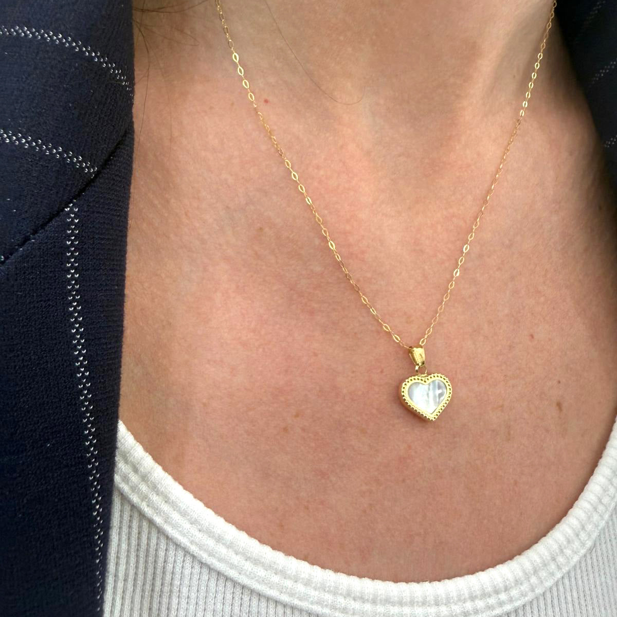 Collana con cuore in madreperla e oro giallo 18KT (750)