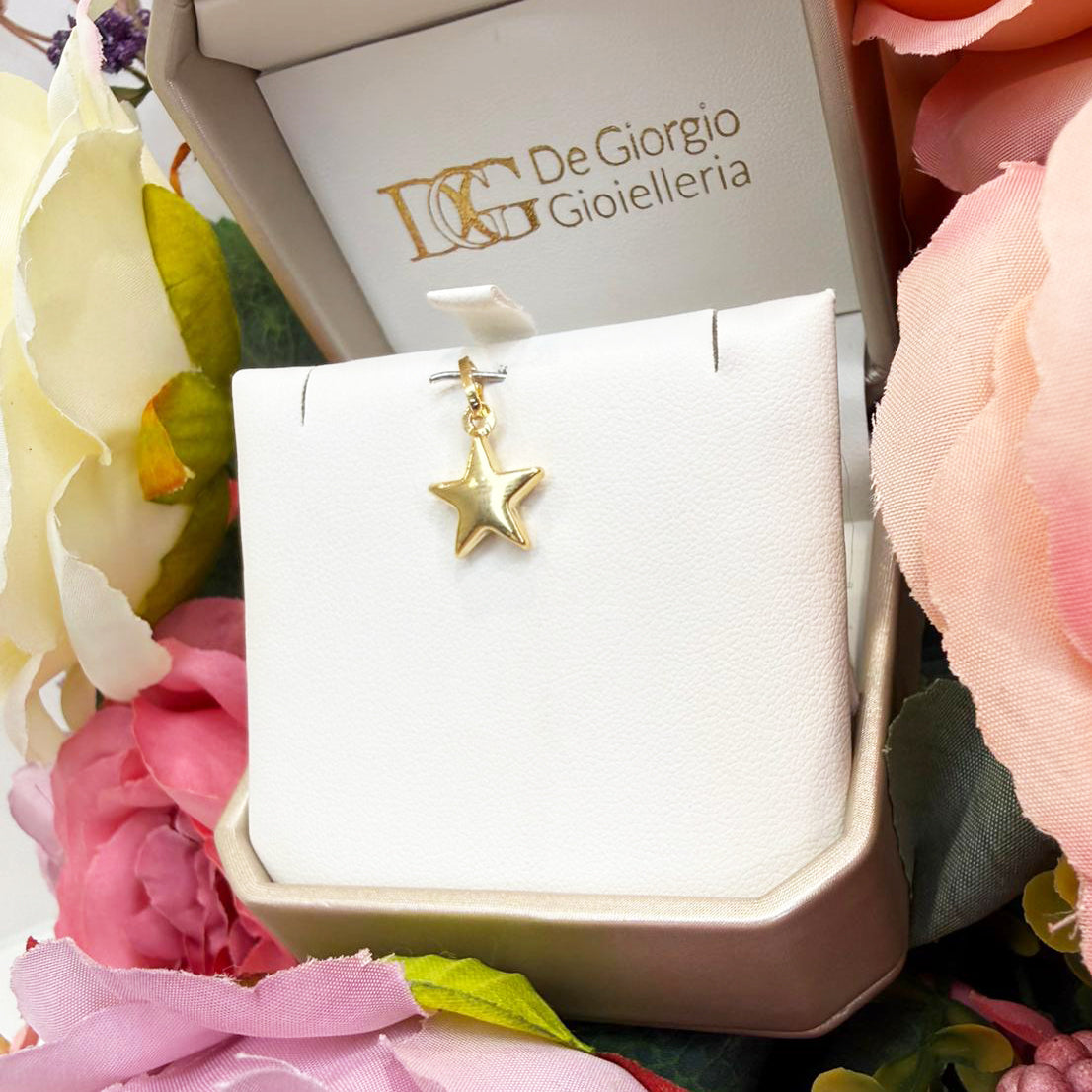 Ciondolo stella da donna in oro giallo (750)