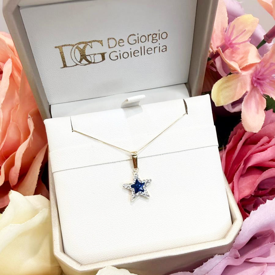 Ciondolo stella da donna con pietra blu e zirconi in oro giallo (750)