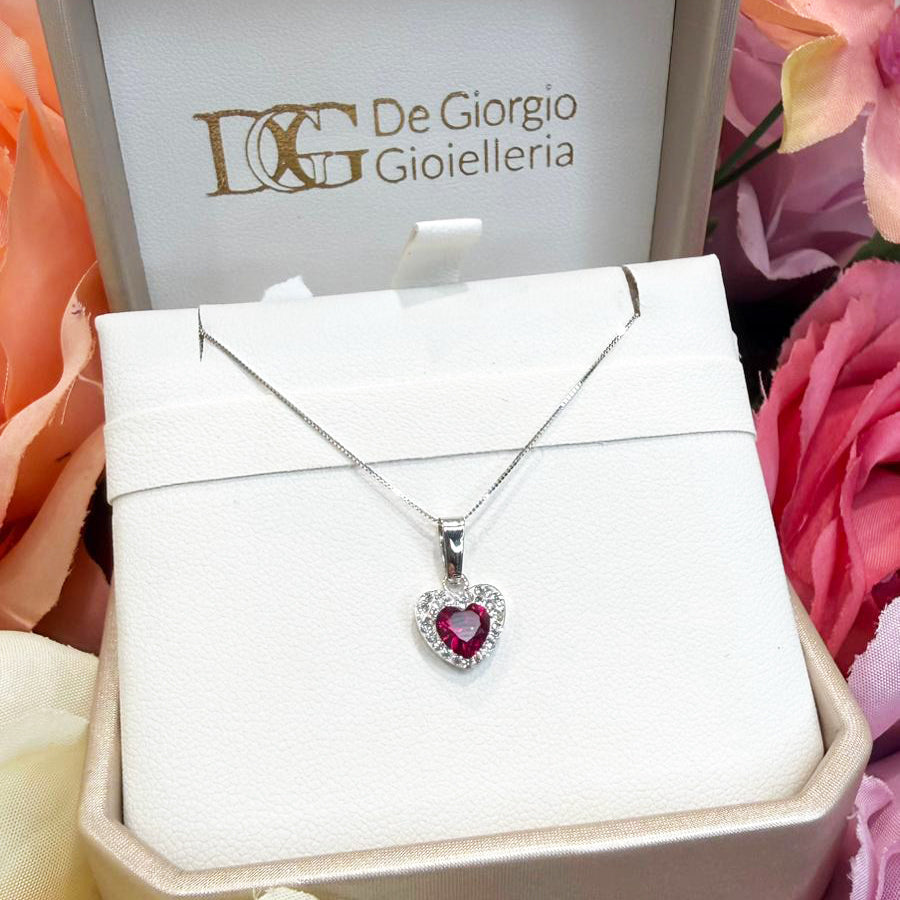 Ciondolo cuore da donna con pietra rossa e zirconi in oro bianco (750)