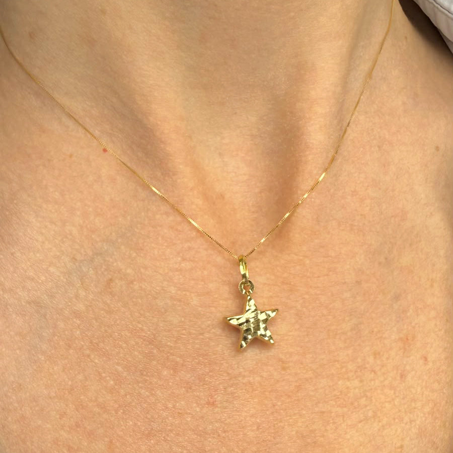 Collana con stella sfaccettata in oro giallo 18 KT (750)