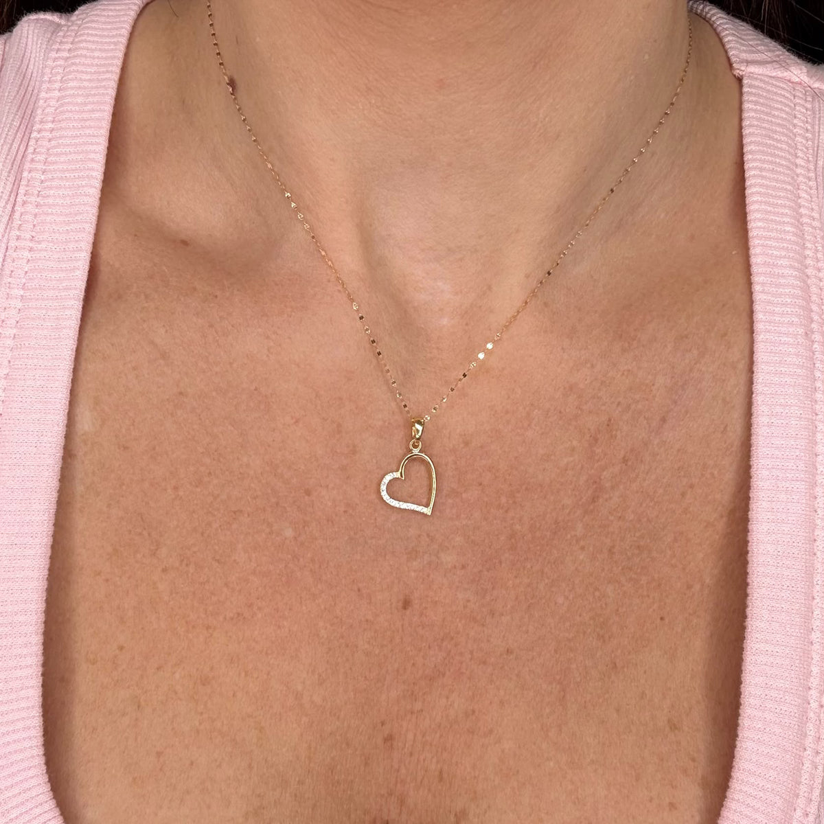 COLLANA CON PENDENTE CUORE TRAFORATO E ZIRCONI IN ORO 18 KT