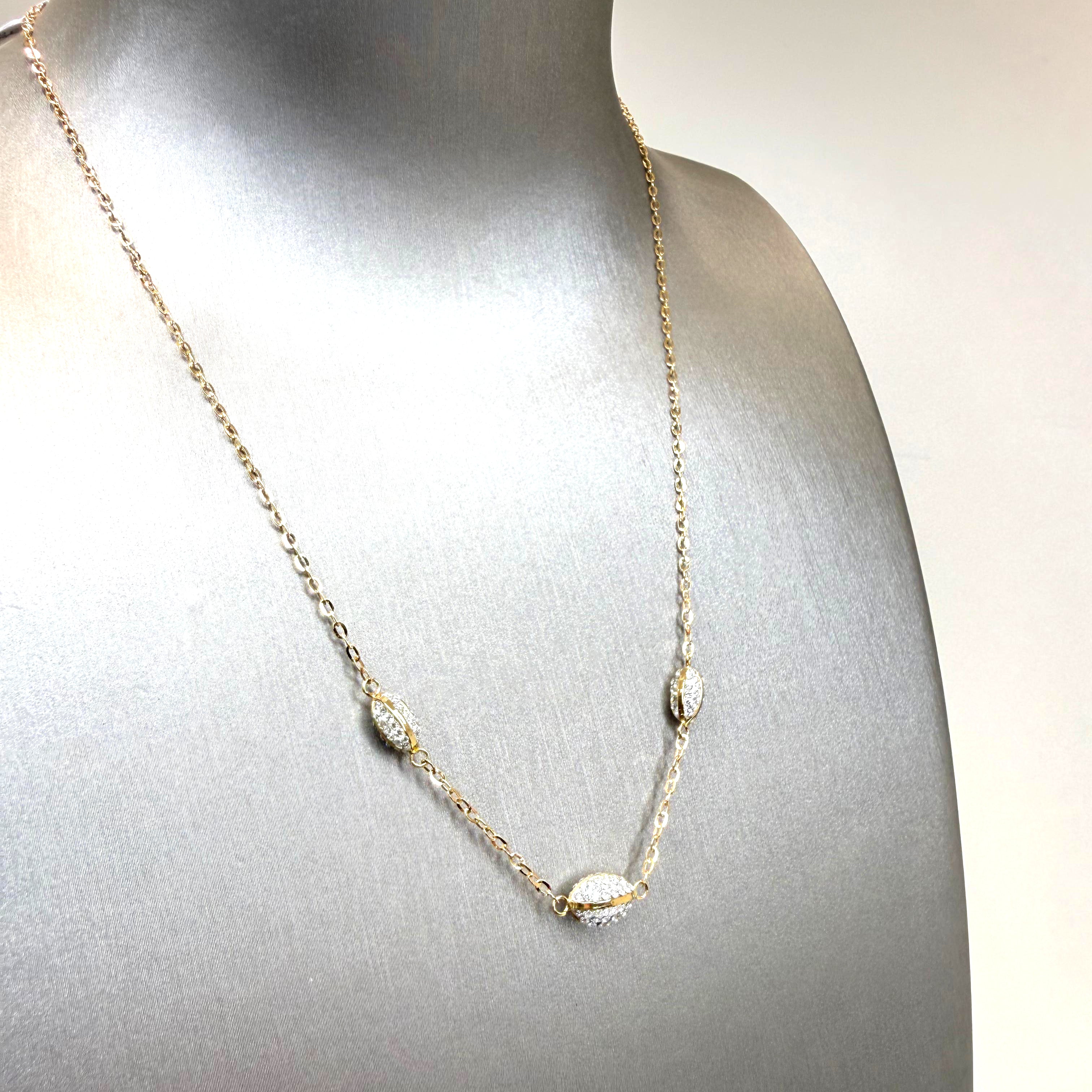 Collana con elementi ovali e zirconi in oro giallo e bianco 18KT (750) – Made in Italy