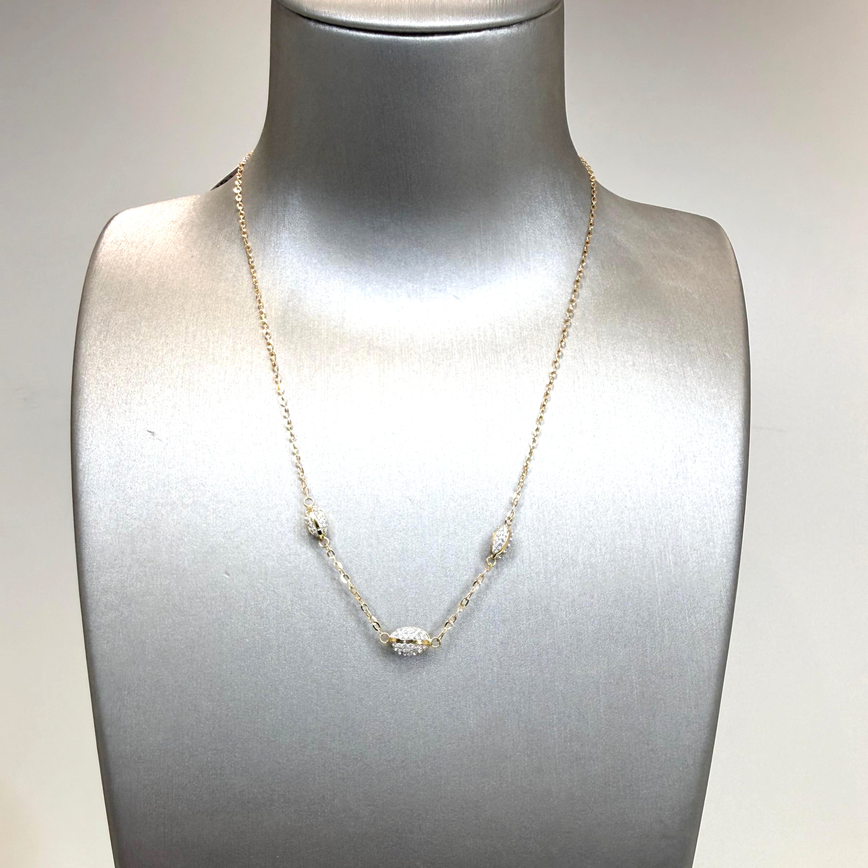 Collana con elementi ovali e zirconi in oro giallo e bianco 18KT (750) – Made in Italy