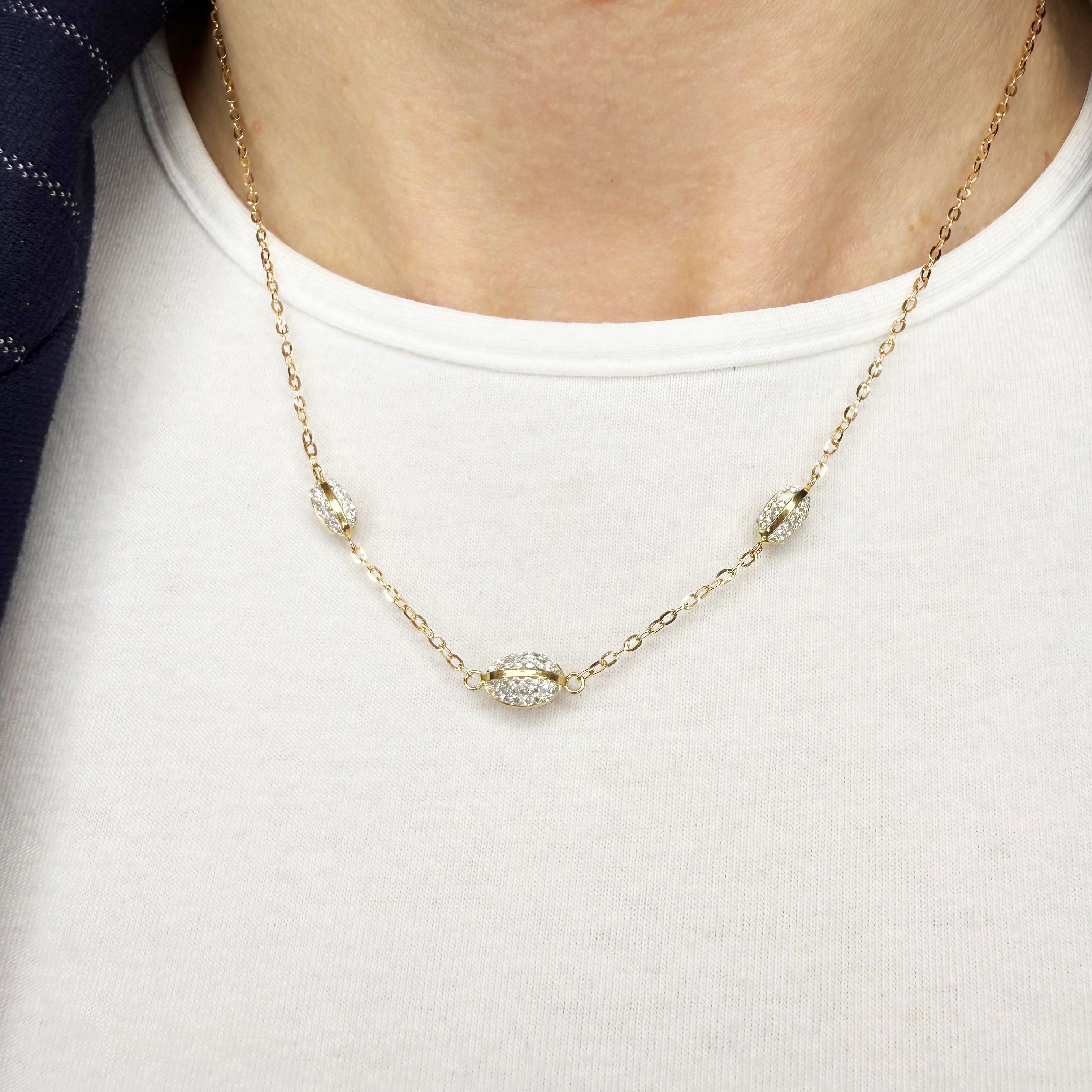 Collana con elementi ovali e zirconi in oro giallo e bianco 18KT (750) – Made in Italy