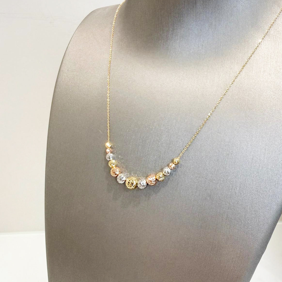 Collana con sfere diamantate in oro giallo, bianco e rosa 18KT (750)