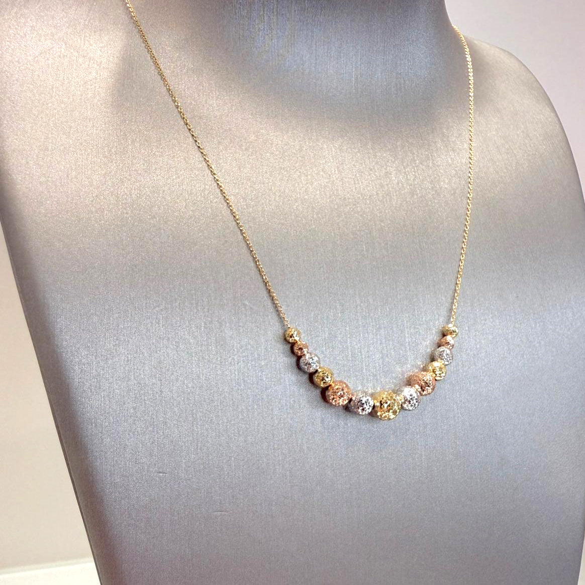 Collana con sfere diamantate in oro giallo, bianco e rosa 18KT (750)