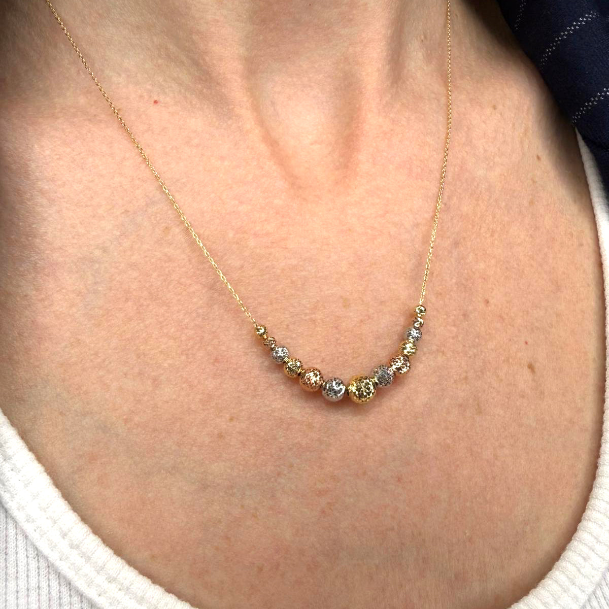 Collana con sfere diamantate in oro giallo, bianco e rosa 18KT (750)