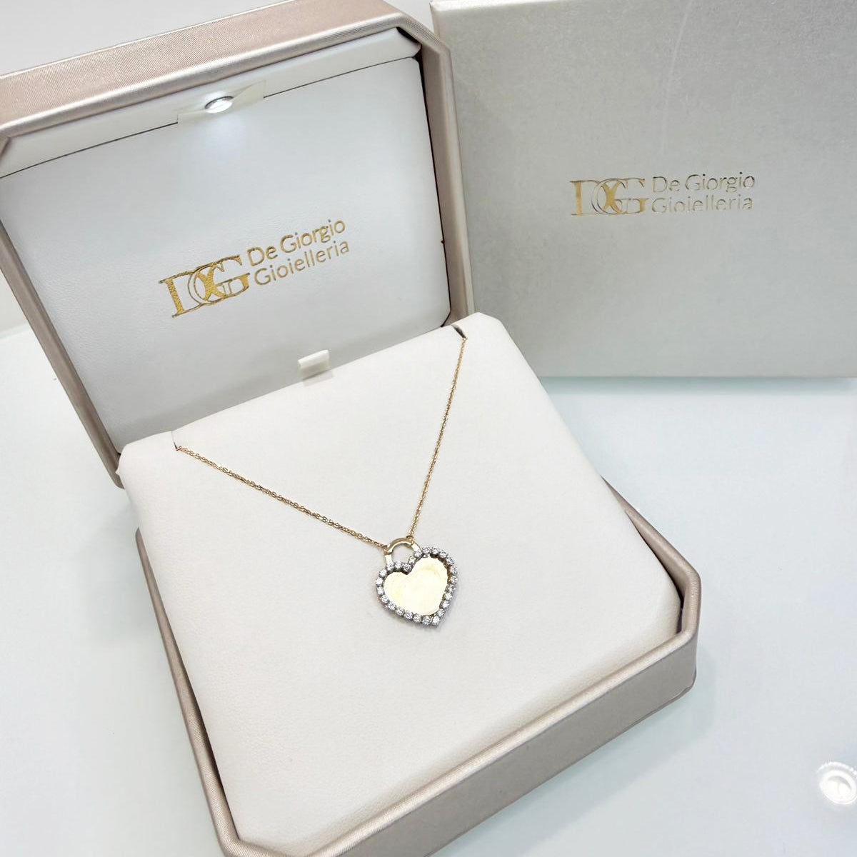 Collana con ciondolo cuore double face in oro giallo 18KT (750) con zirconi