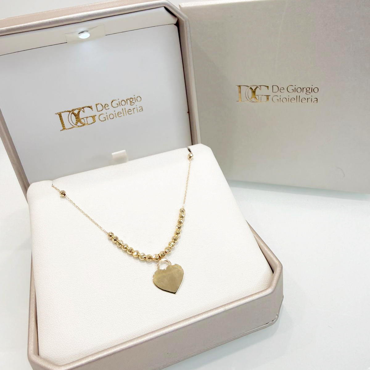 Collana con cuore incidibile in oro giallo 18KT (750) e sfere diamantate
