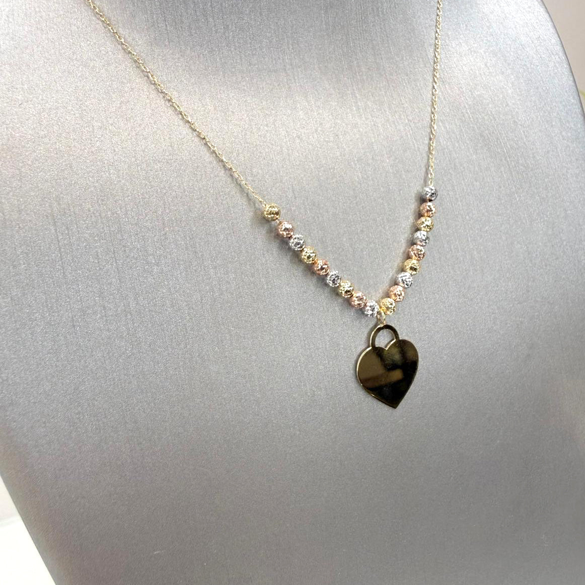 Collana con cuore incidibile in oro bianco, giallo e rosa 18KT (750) e sfere diamantate