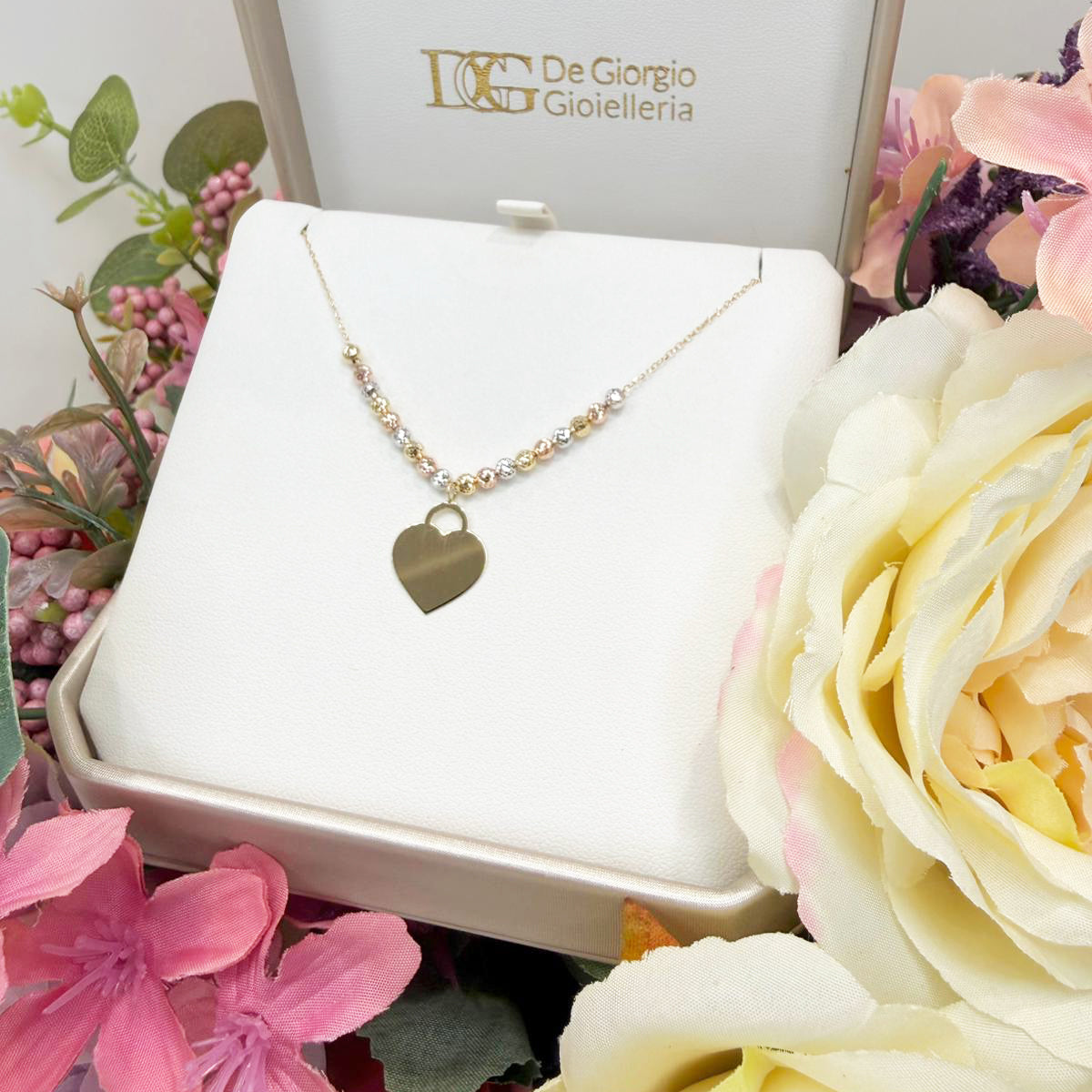 Collana con cuore incidibile in oro bianco, giallo e rosa 18KT (750) e sfere diamantate