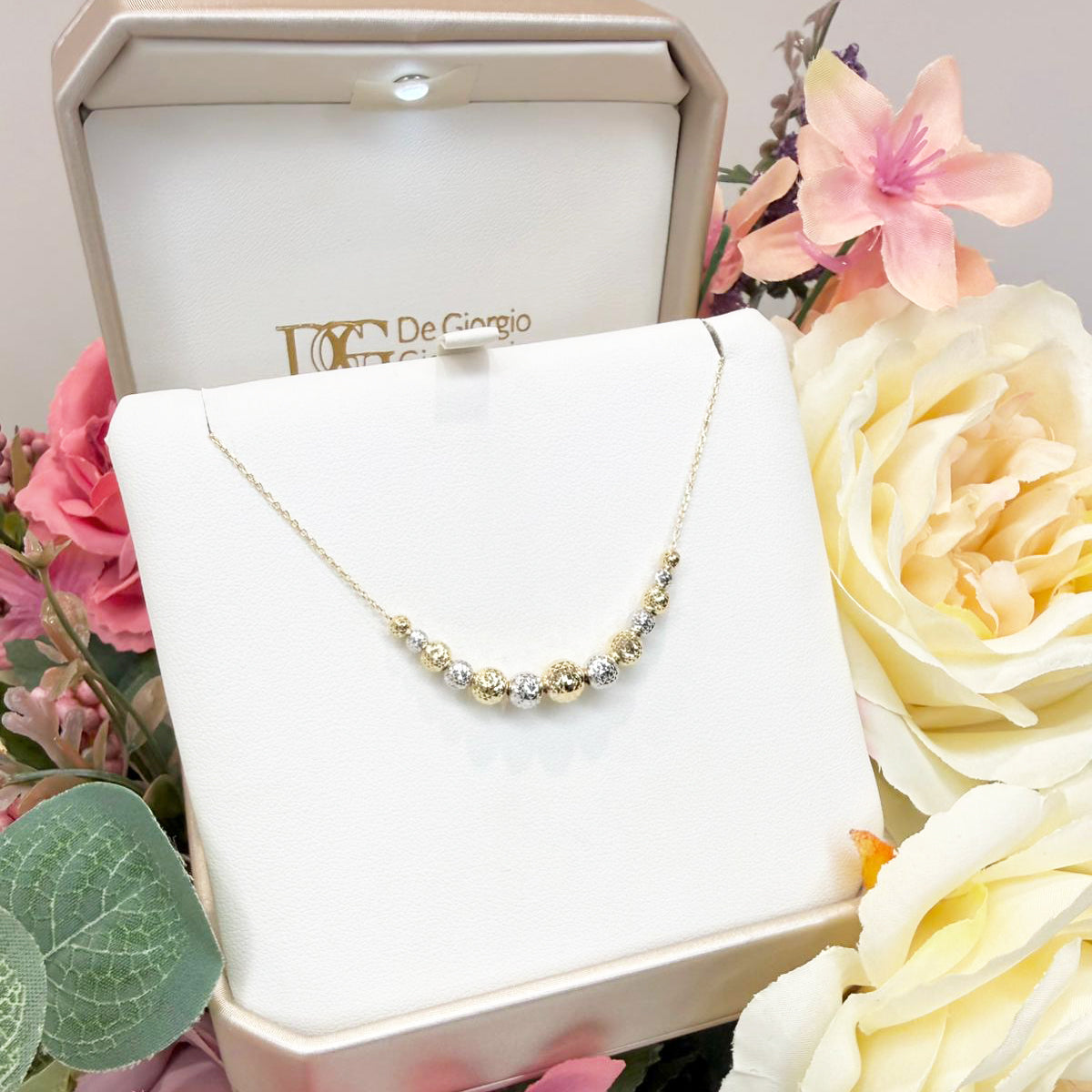 Collana con sfere diamantate bicolore in oro 18KT (750)