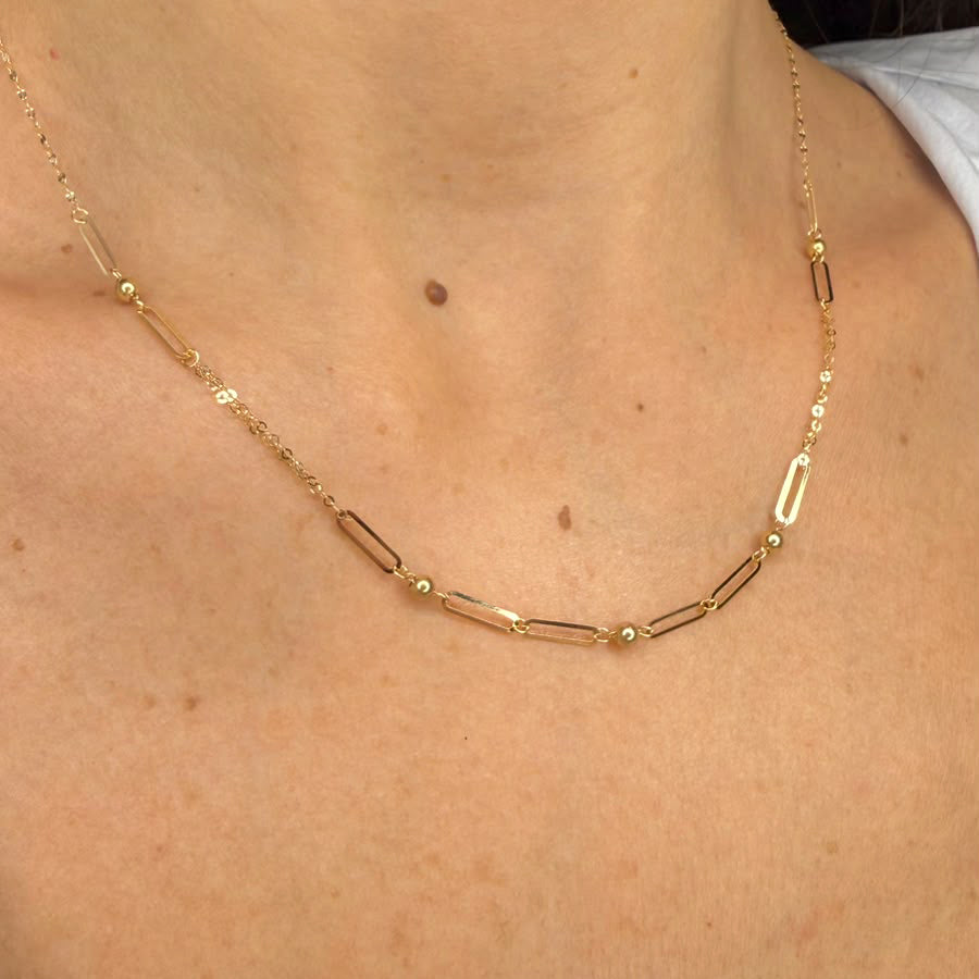 Collana con maglie geometriche e sfere in oro giallo 18 KT (750)