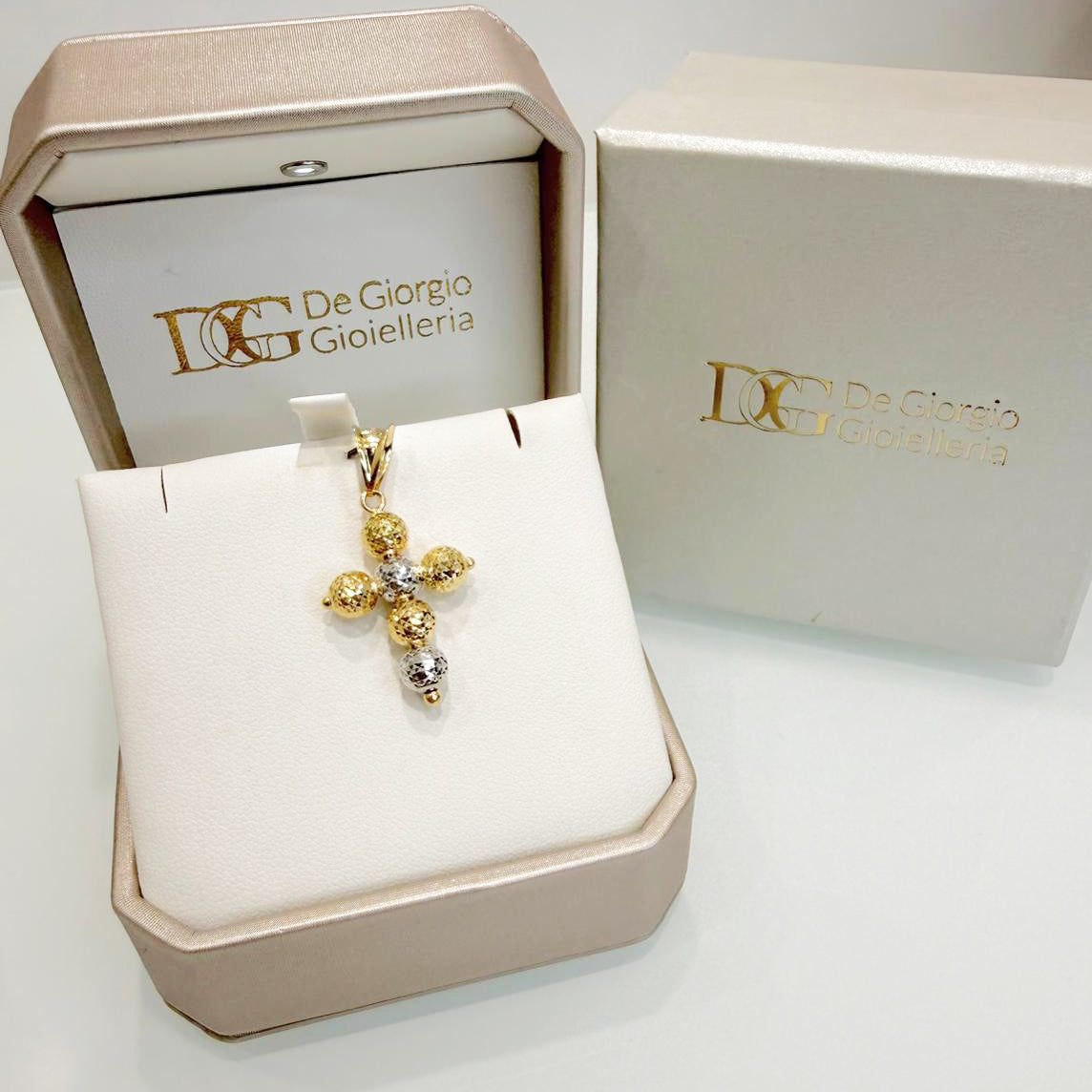 Ciondolo a croce in oro giallo e bianco 18KT (750) con sfere diamantate unisex