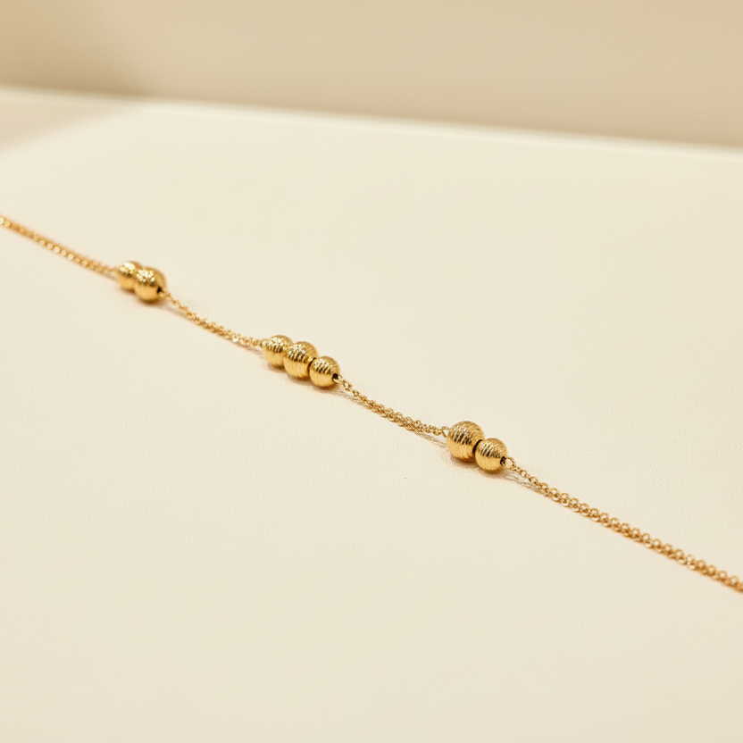 Bracciale con sfere diamantate in oro giallo 18KT (750) – Made in Italy