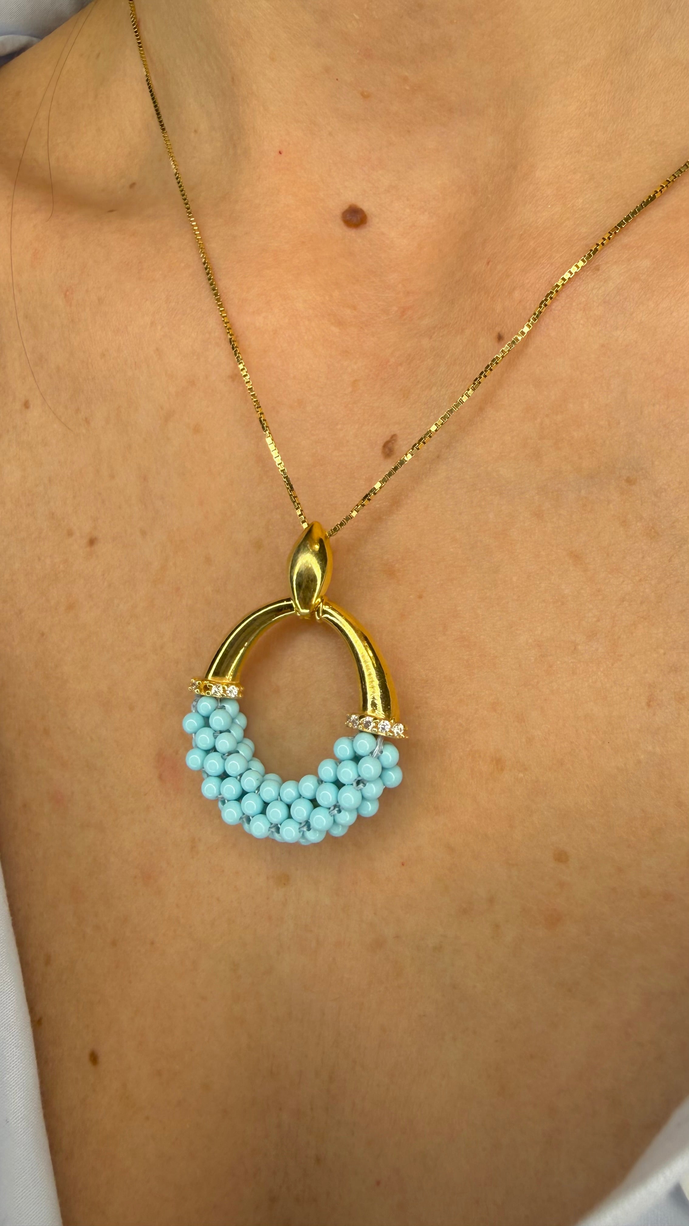 COLLANA CON PASTA DI TURCHESE E ZIRCONI DORATA IN ARGENTO 925