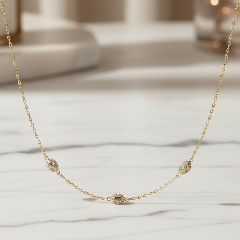 Collana con elementi ovali e zirconi in oro giallo e bianco 18KT (750) – Made in Italy
