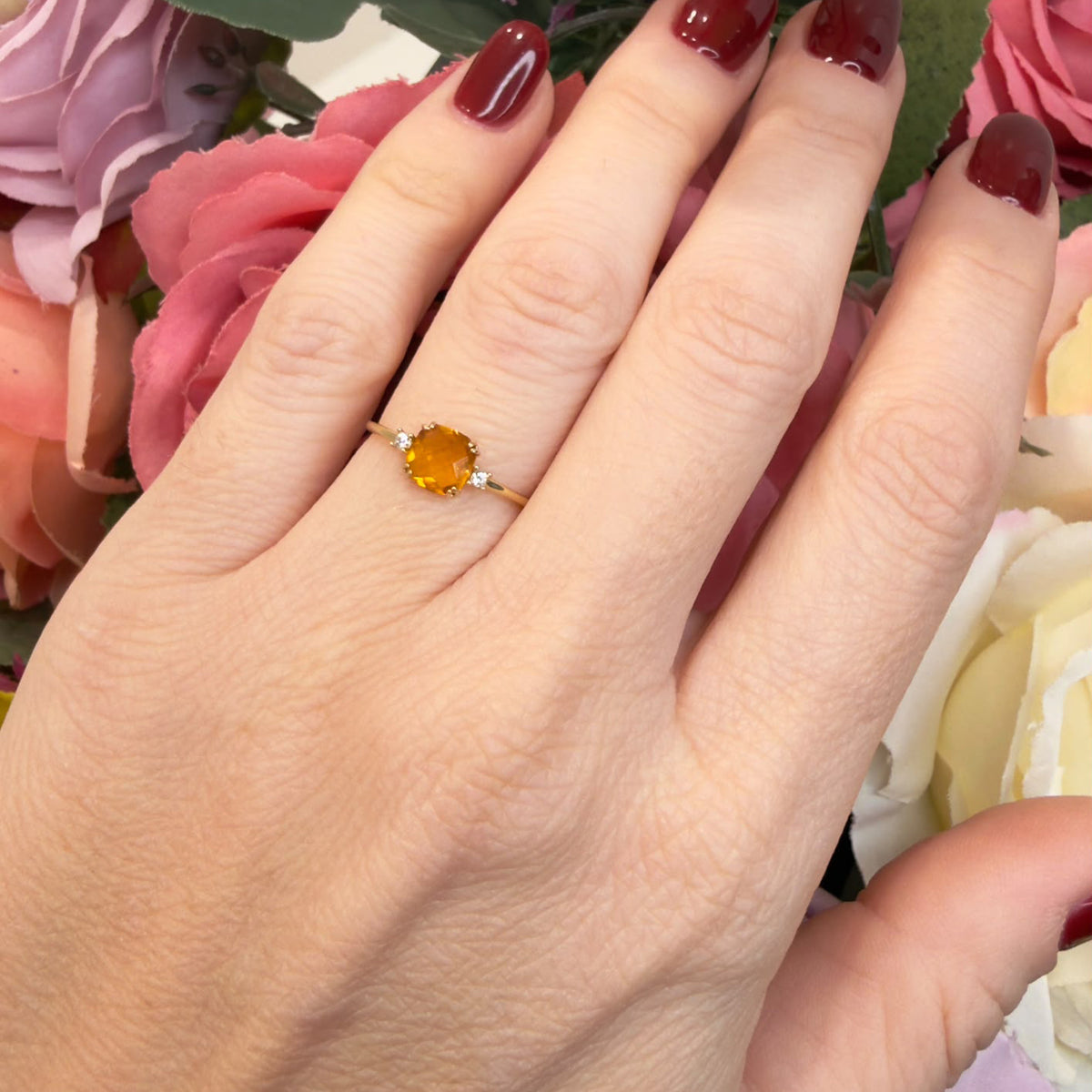 ANELLO IN ORO GIALLO 18 KT (750) CON PIETRA ARANCIONE E ZIRCONI