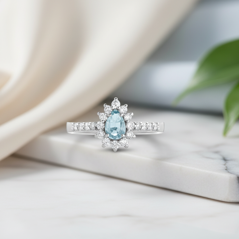 ANELLO GOCCIA IN ORO BIANCO 18KT CON DIAMANTI E ACQUAMARINA