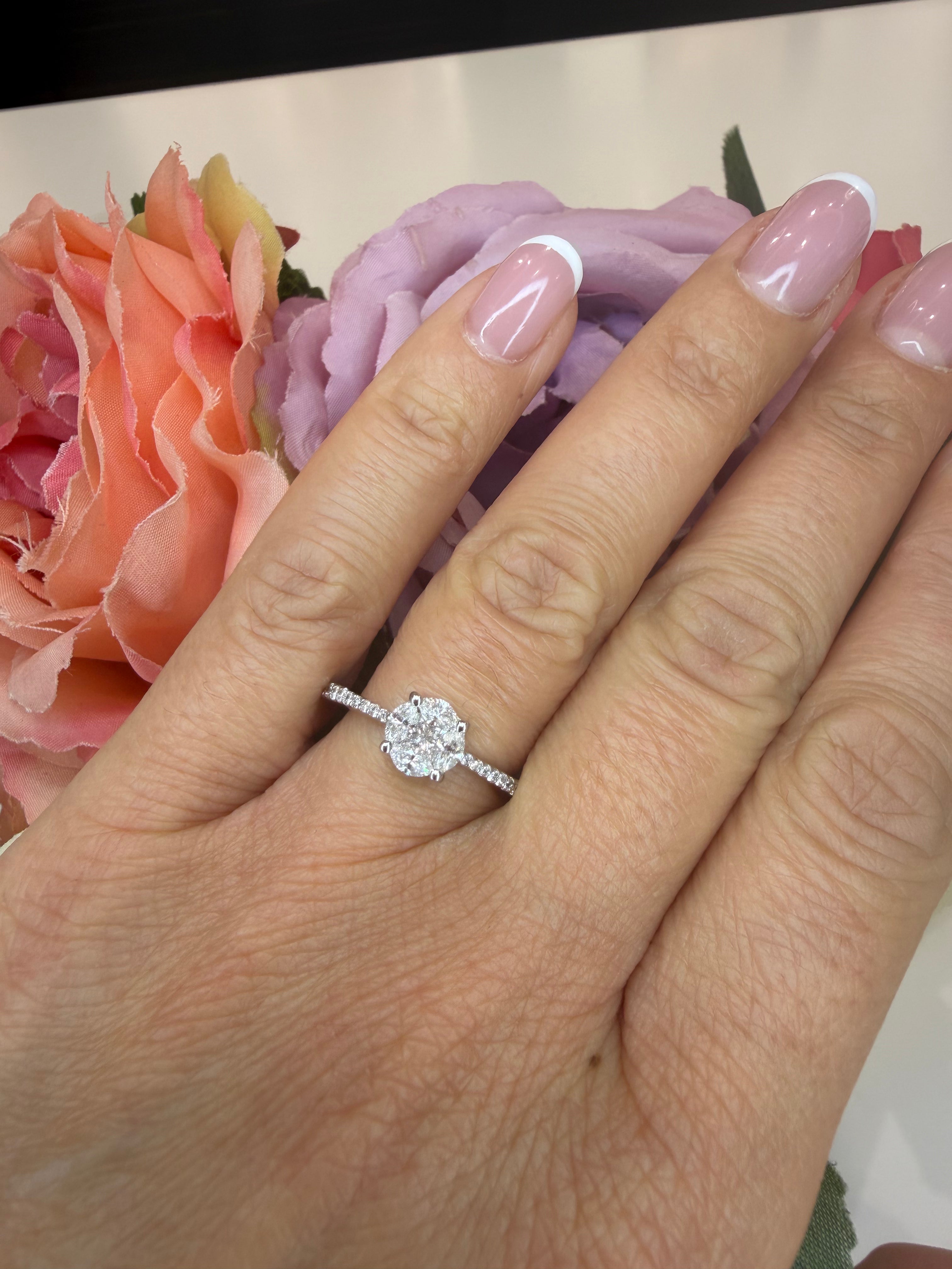 ANELLO SOLITARIO IN ORO BIANCO 18 CARATI E DIAMANTI