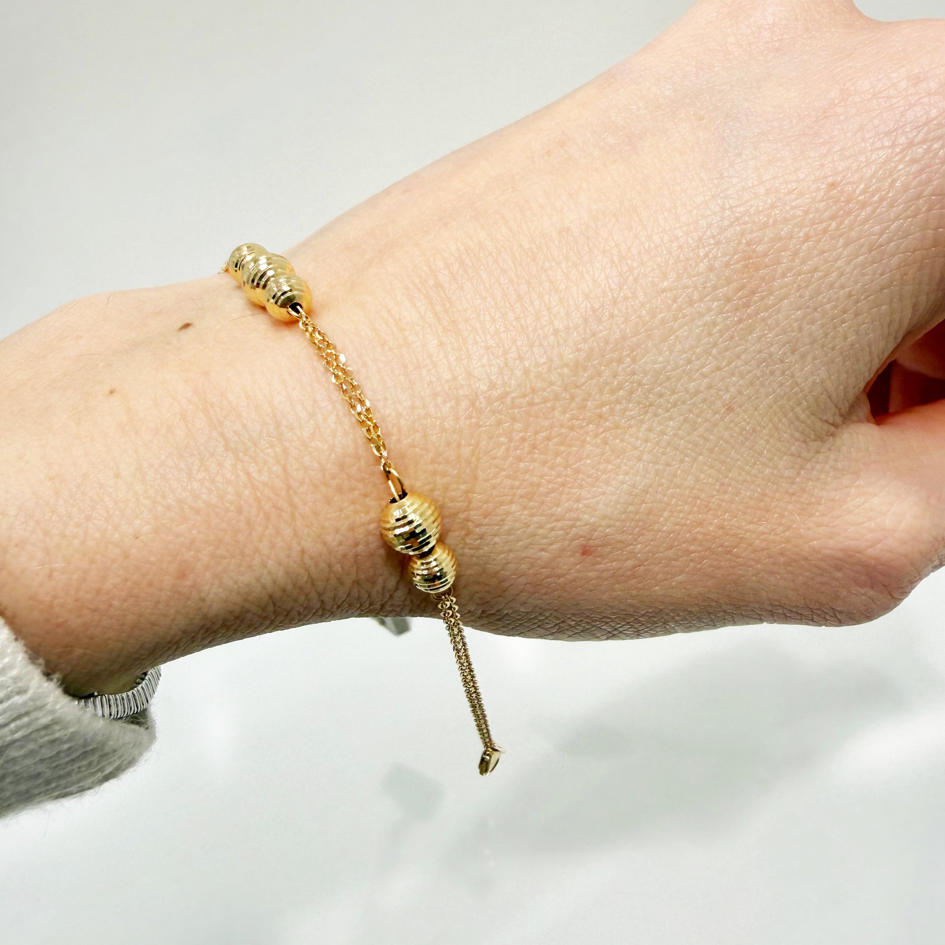 Bracciale con sfere diamantate in oro giallo 18KT (750) – Made in Italy