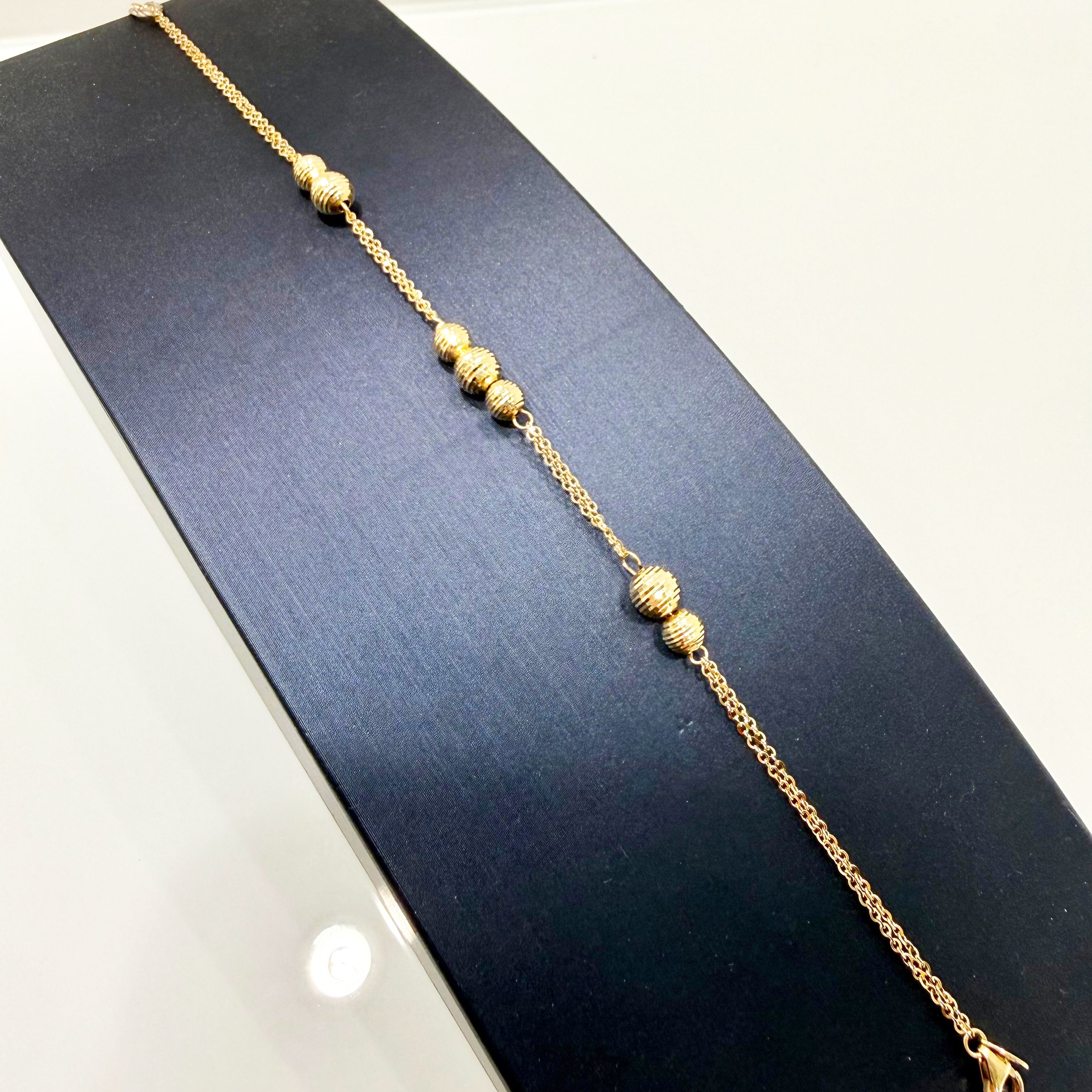 Bracciale con sfere diamantate in oro giallo 18KT (750) – Made in Italy