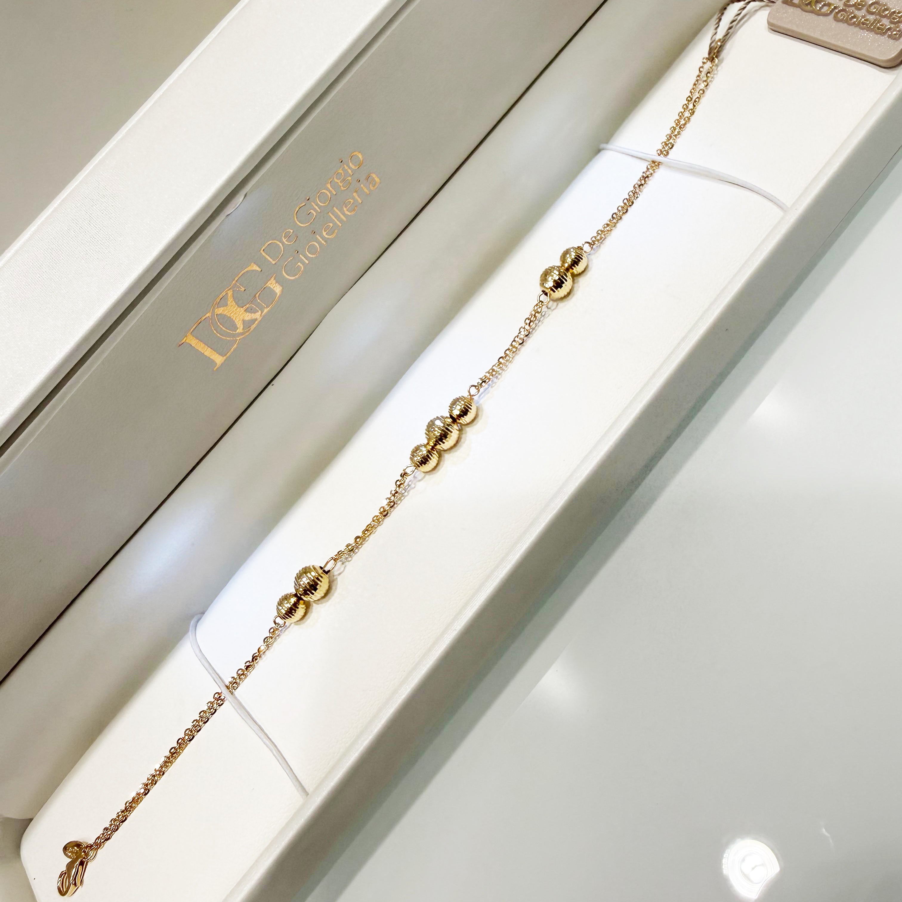 Bracciale con sfere diamantate in oro giallo 18KT (750) – Made in Italy