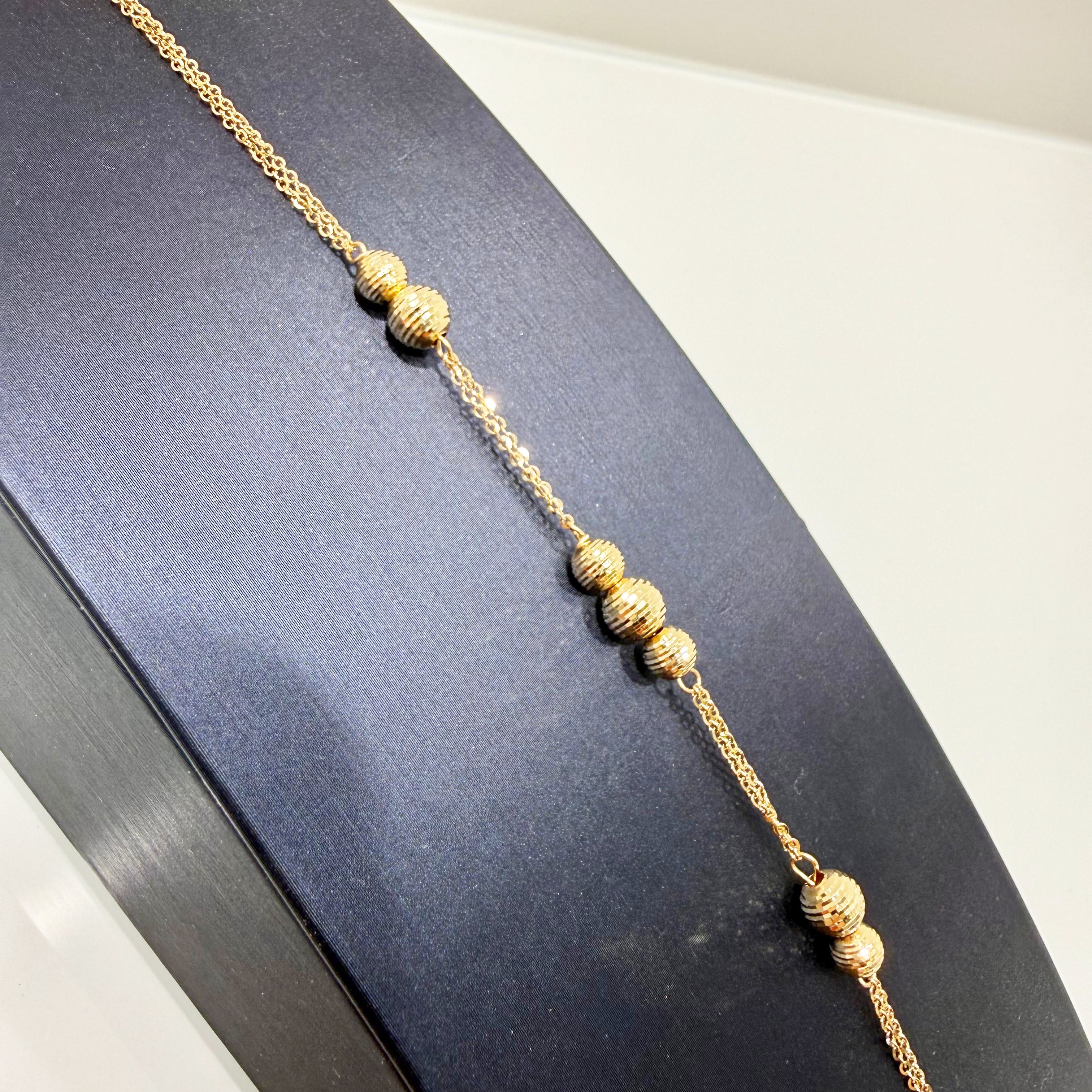 Bracciale con sfere diamantate in oro giallo 18KT (750) – Made in Italy