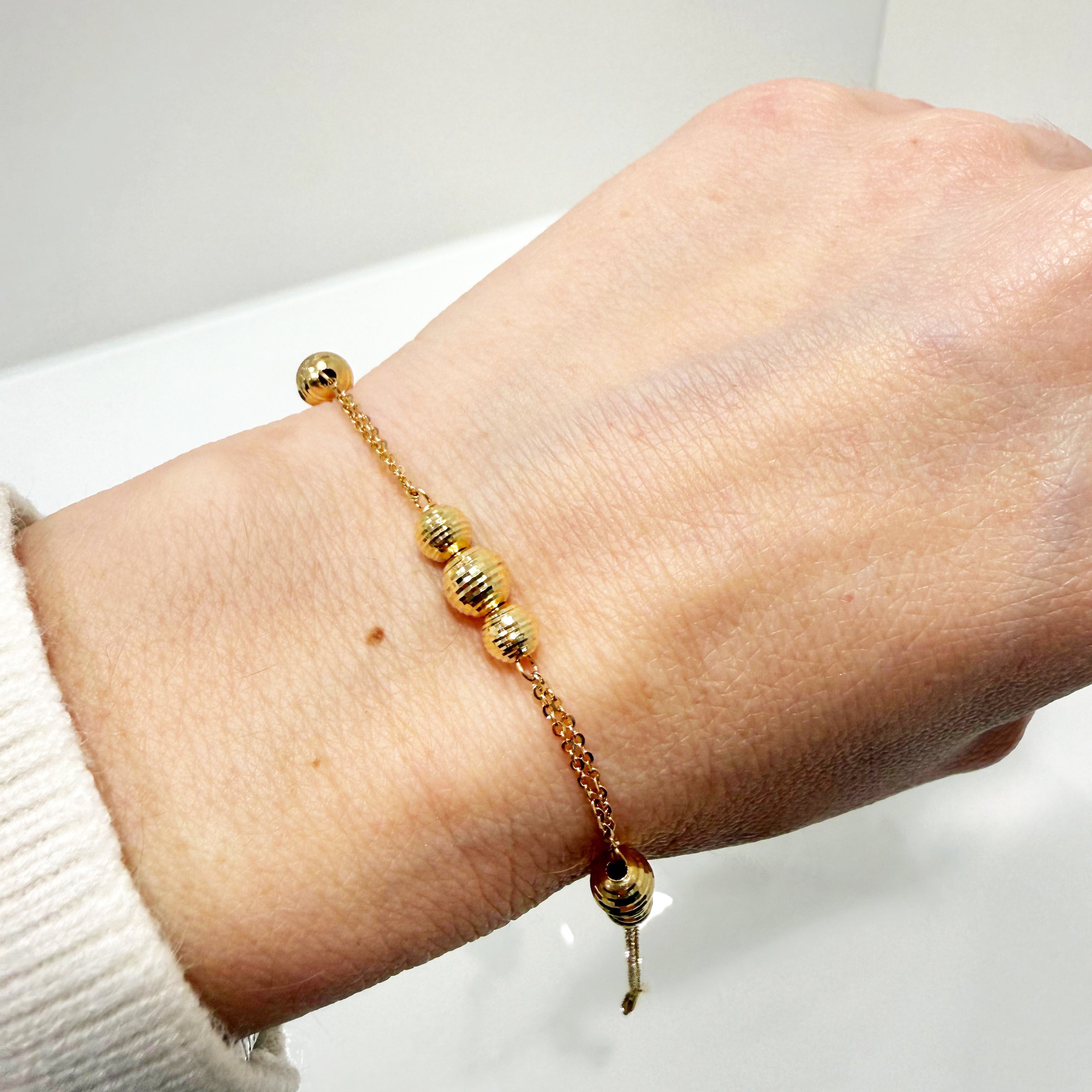 Bracciale con sfere diamantate in oro giallo 18KT (750) – Made in Italy