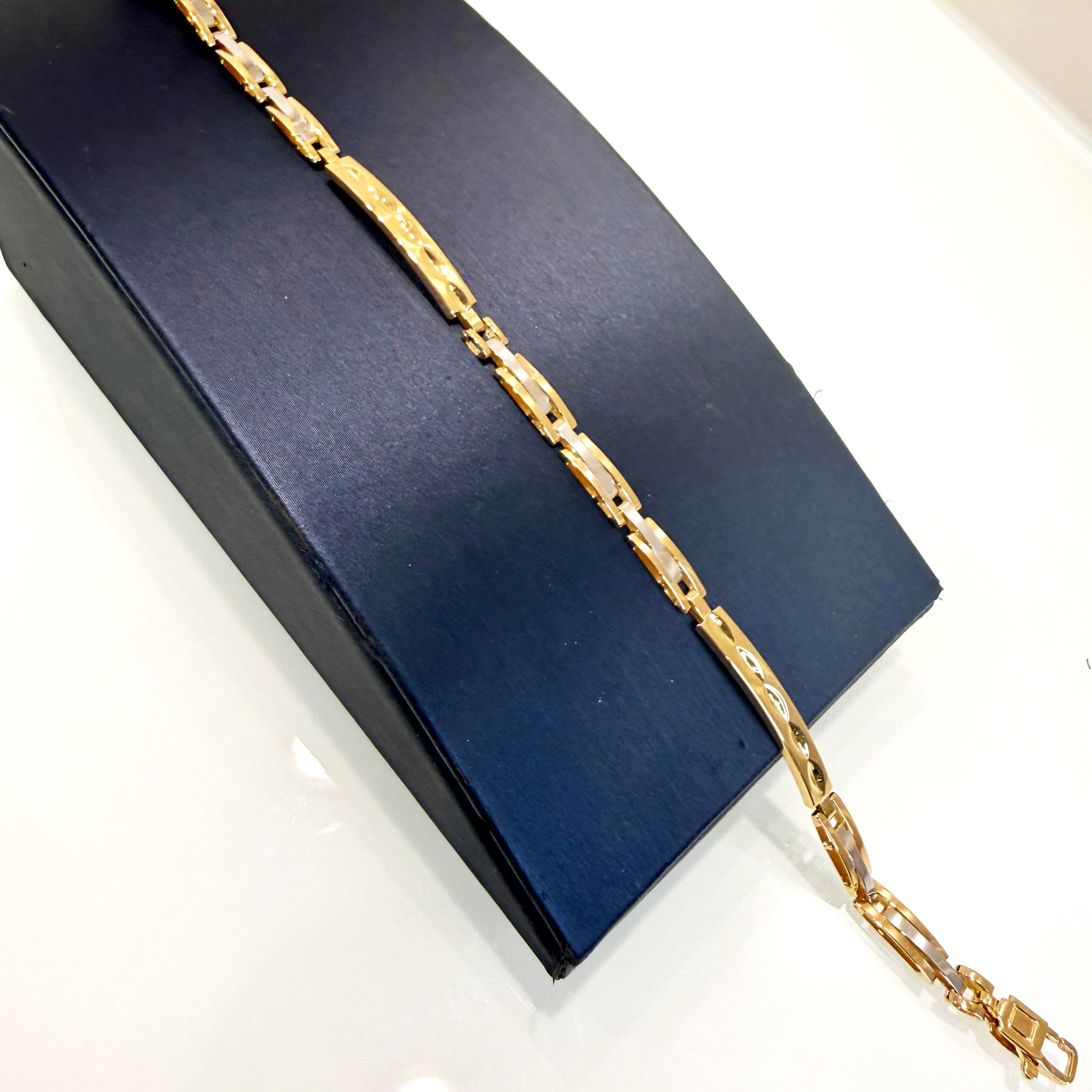 Bracciale uomo bicolore in oro giallo e oro bianco 18KT (750) con maglie lavorate – Made in Italy