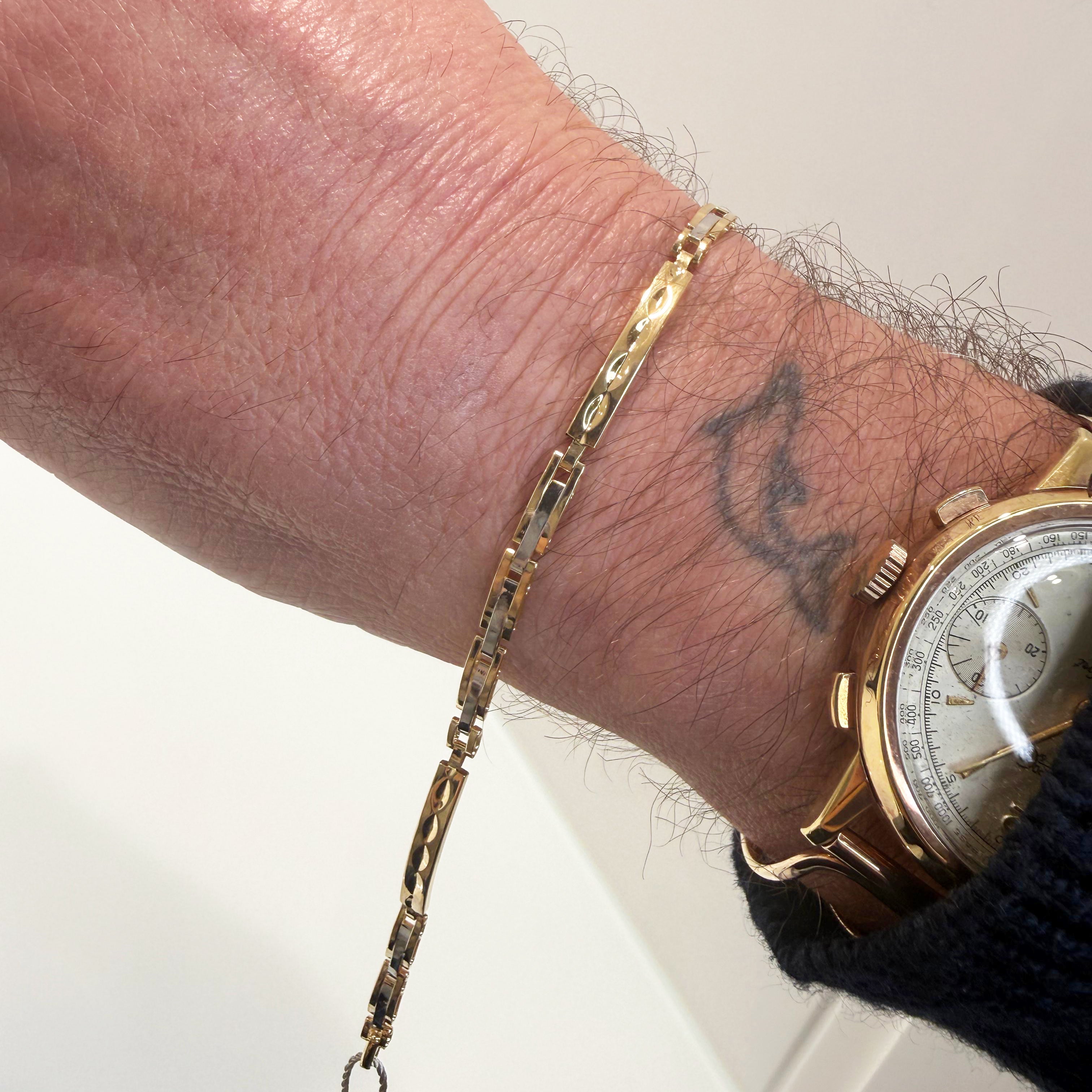 Bracciale uomo bicolore in oro giallo e oro bianco 18KT (750) con maglie lavorate – Made in Italy