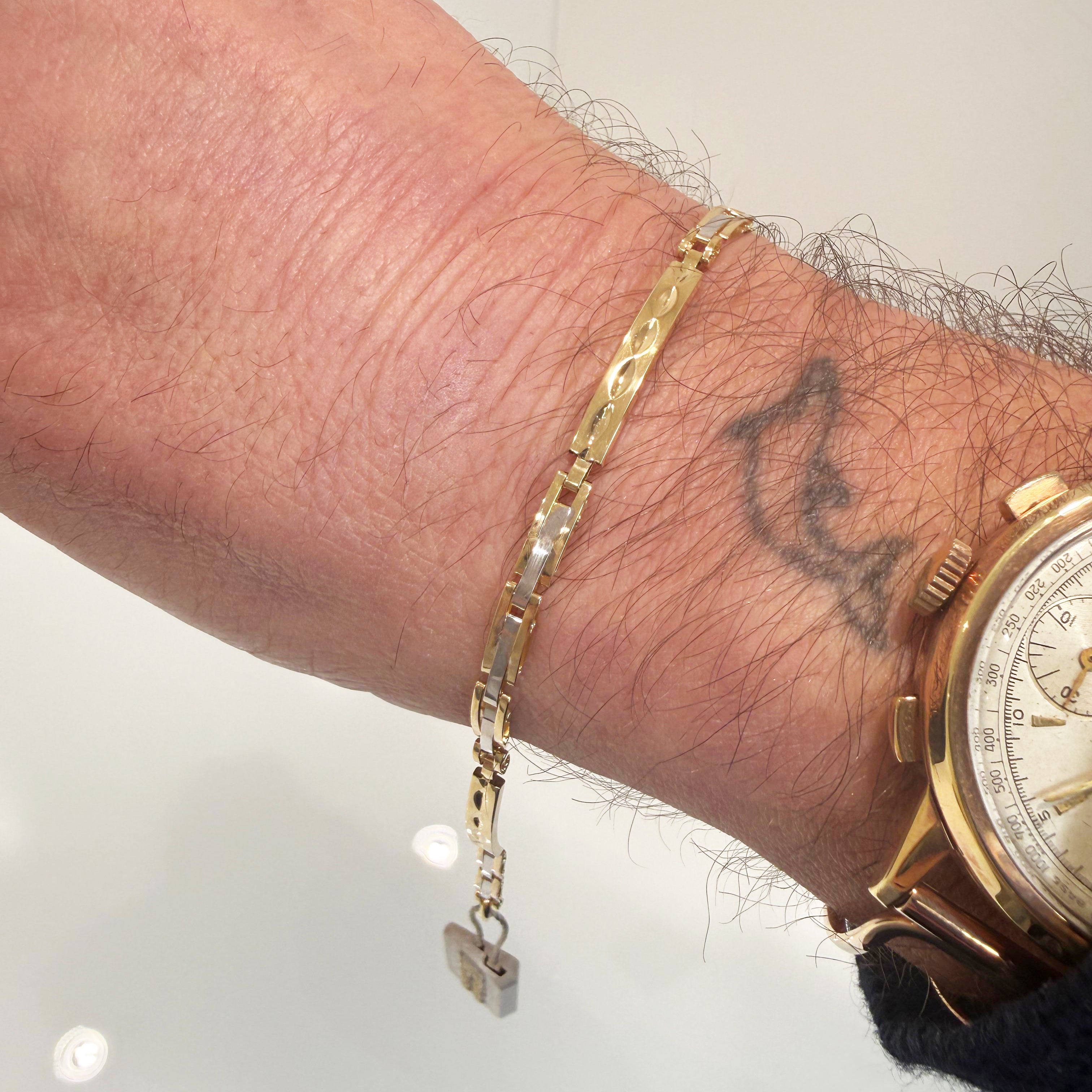 Bracciale uomo bicolore in oro giallo e oro bianco 18KT (750) con maglie lavorate – Made in Italy