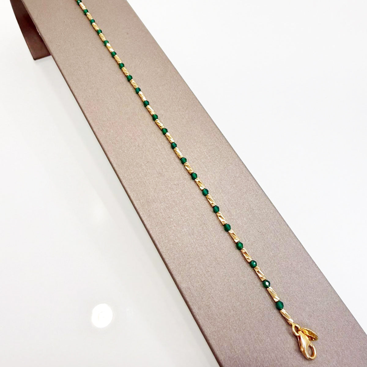 Bracciale con sfere verdi in oro giallo 18KT (750) – Unisex Elegante