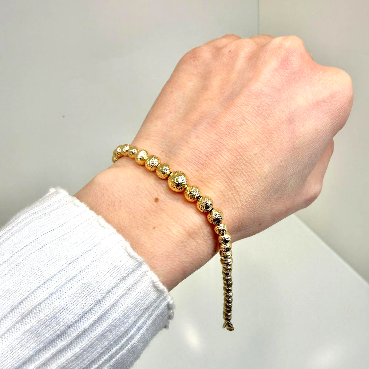 Bracciale sfere diamantate in oro giallo 18KT (750) – Elegante effetto luminoso
