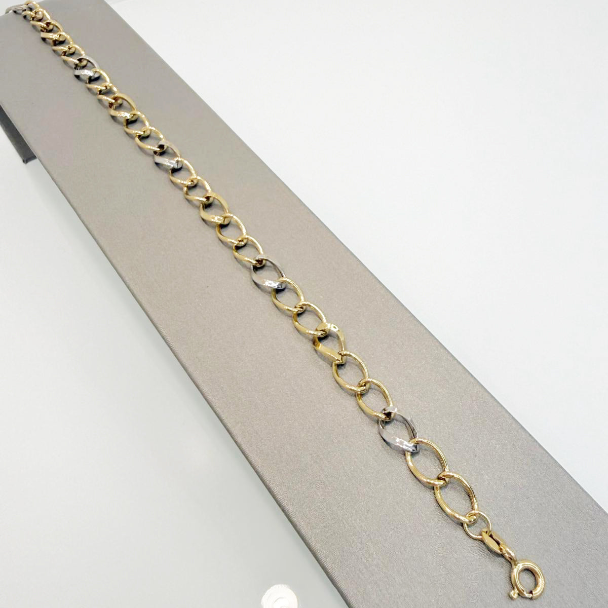 Bracciale in oro giallo e bianco 18KT (750) a maglia alternata